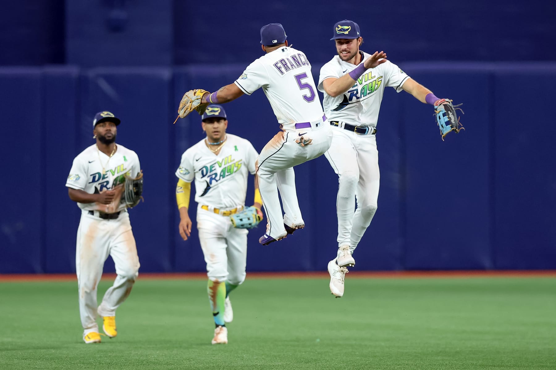 ST. PETERSBURG, FL - MAY 5: Wander Franco #5 of the Tampa Bay Rays jumps with  teammate Josh Lowe #15 to celebrate their win over the New York Yankees during a baseball game at Tropicana Field on May 5, 2023 in St. Petersburg, Florida. (Photo by Mike Carlson/Getty Images)