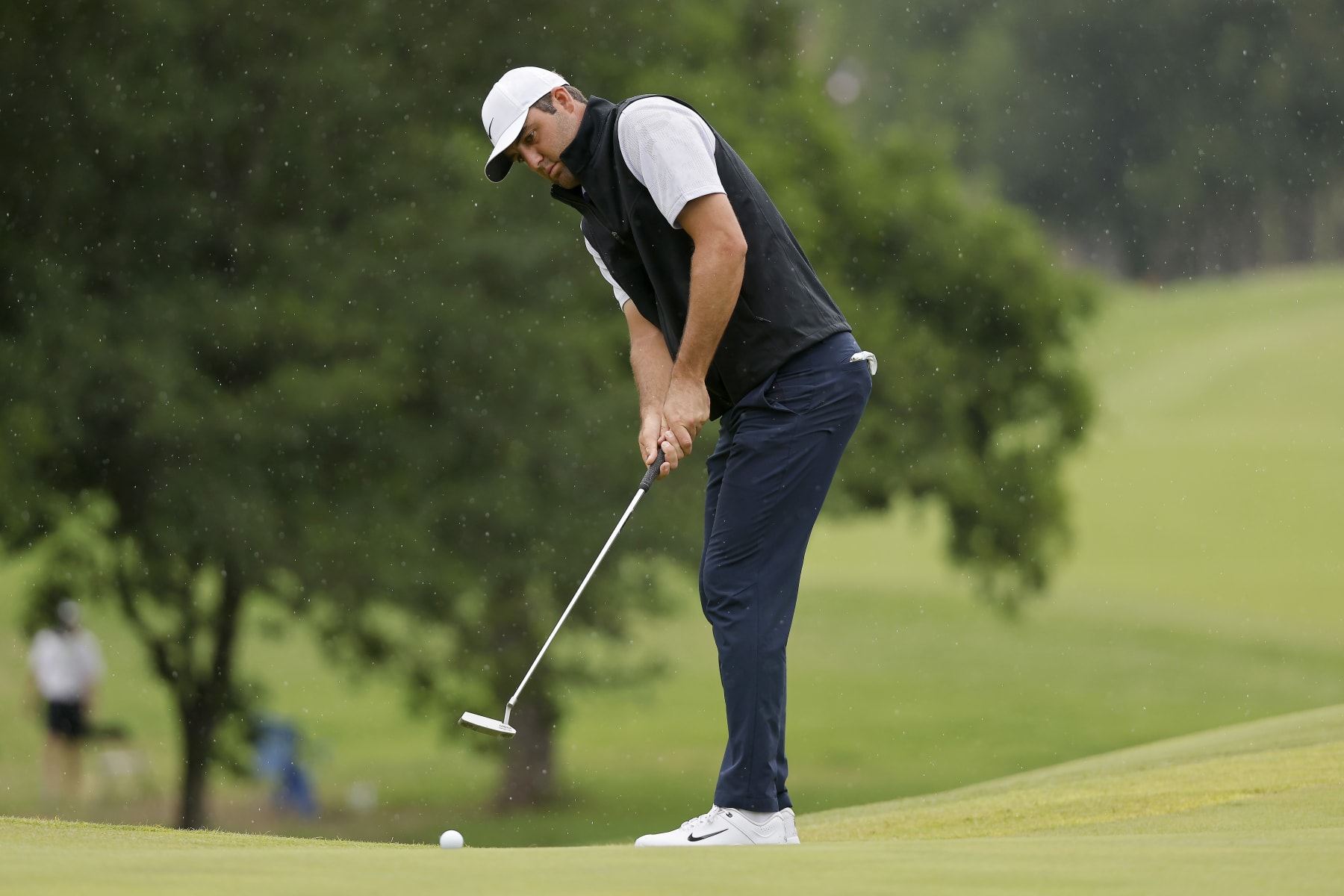 MCKINNEY, TEXAS - MAY 14: Scottie Scheffler of the United States putts on the first green during the final round of the AT&T Byron Nelson at TPC Craig Ranch on May 14, 2023 in McKinney, Texas. (Photo by Mike Mulholland/Getty Images)