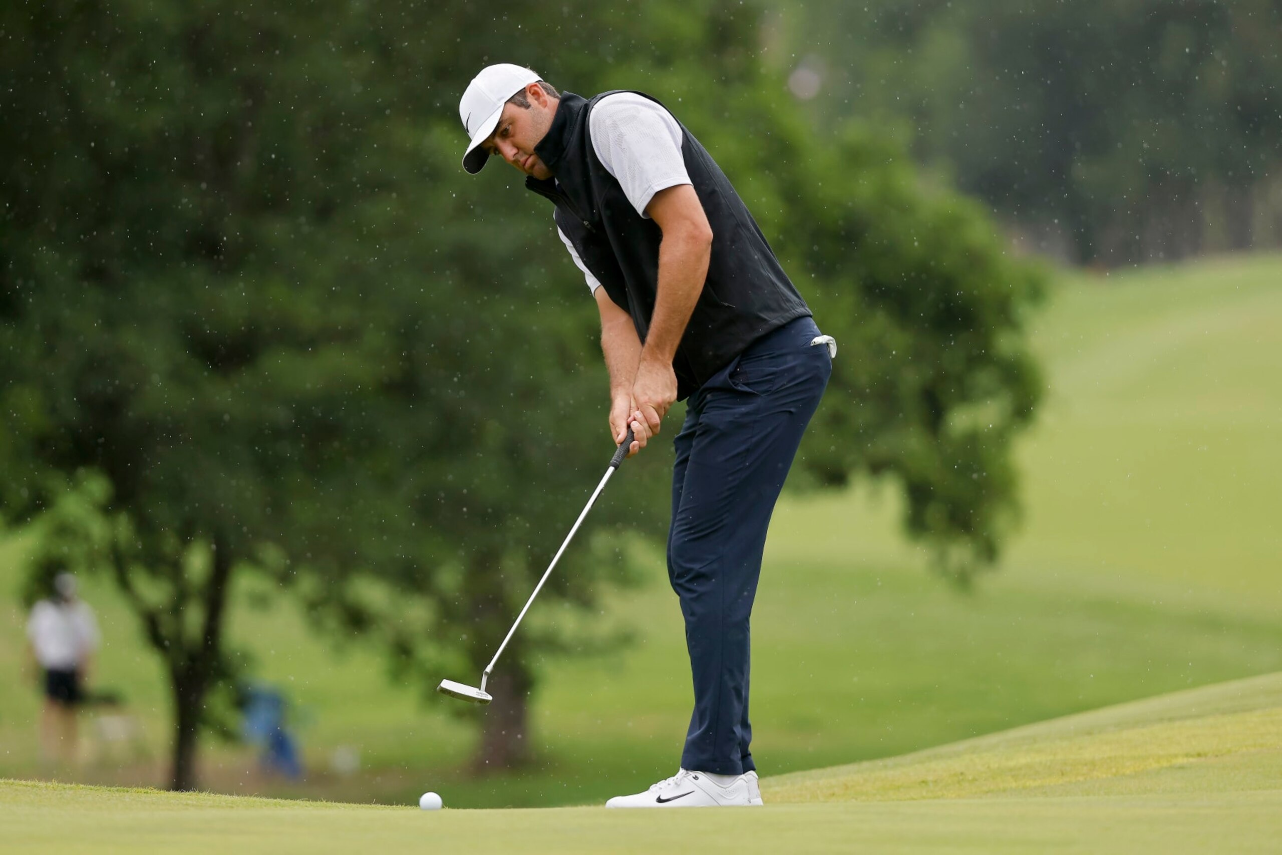 MCKINNEY, TEXAS - MAY 14: Scottie Scheffler of the United States putts on the first green during the final round of the AT&T Byron Nelson at TPC Craig Ranch on May 14, 2023 in McKinney, Texas. (Photo by Mike Mulholland/Getty Images)