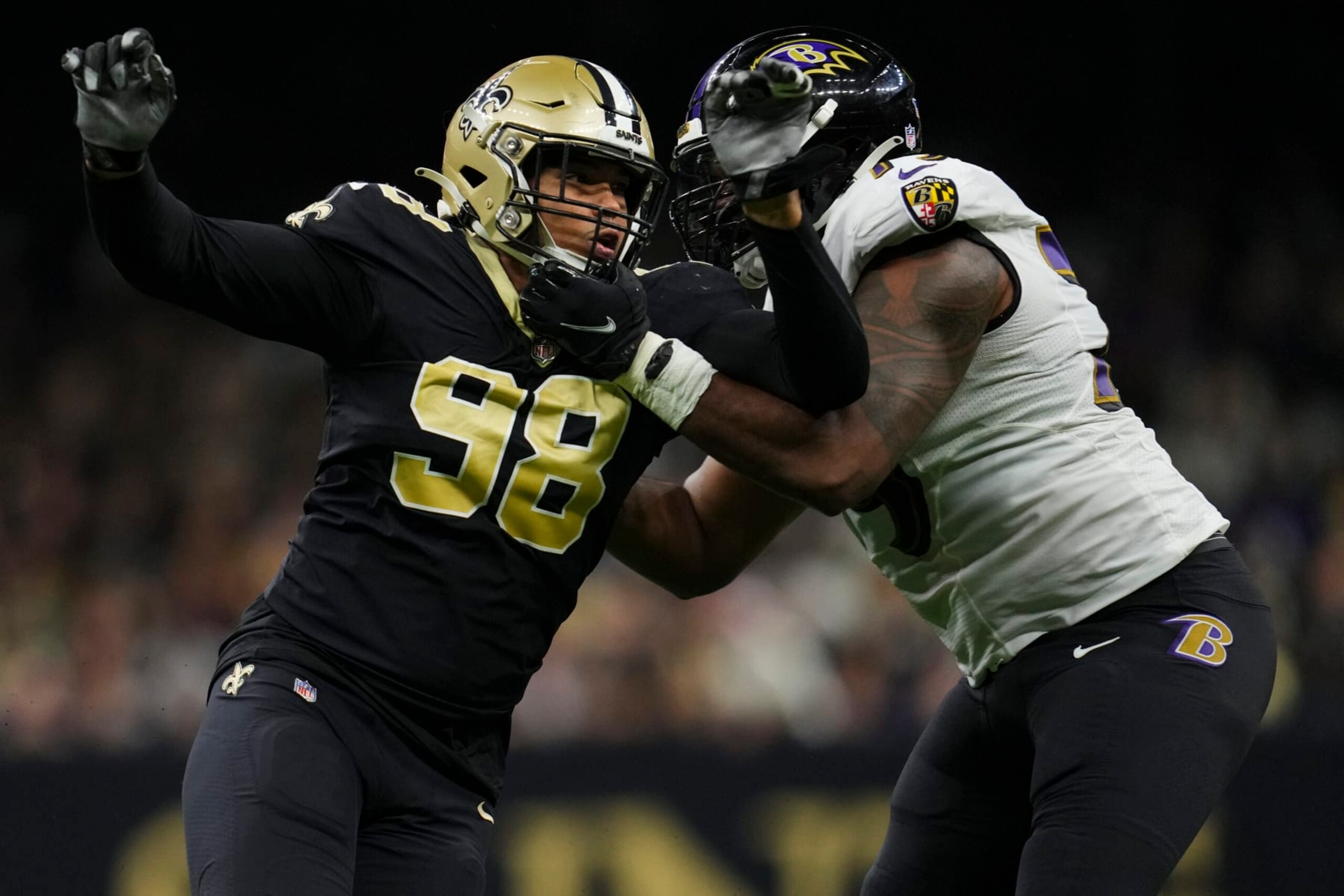 NEW ORLEANS, LA - NOVEMBER 07: Payton Turner #98 of the New Orleans Saints battles with Ronnie Stanley #79 of the Baltimore Ravens at Caesars Superdome on November 7, 2022 in New Orleans, Louisiana. (Photo by Cooper Neill/Getty Images)