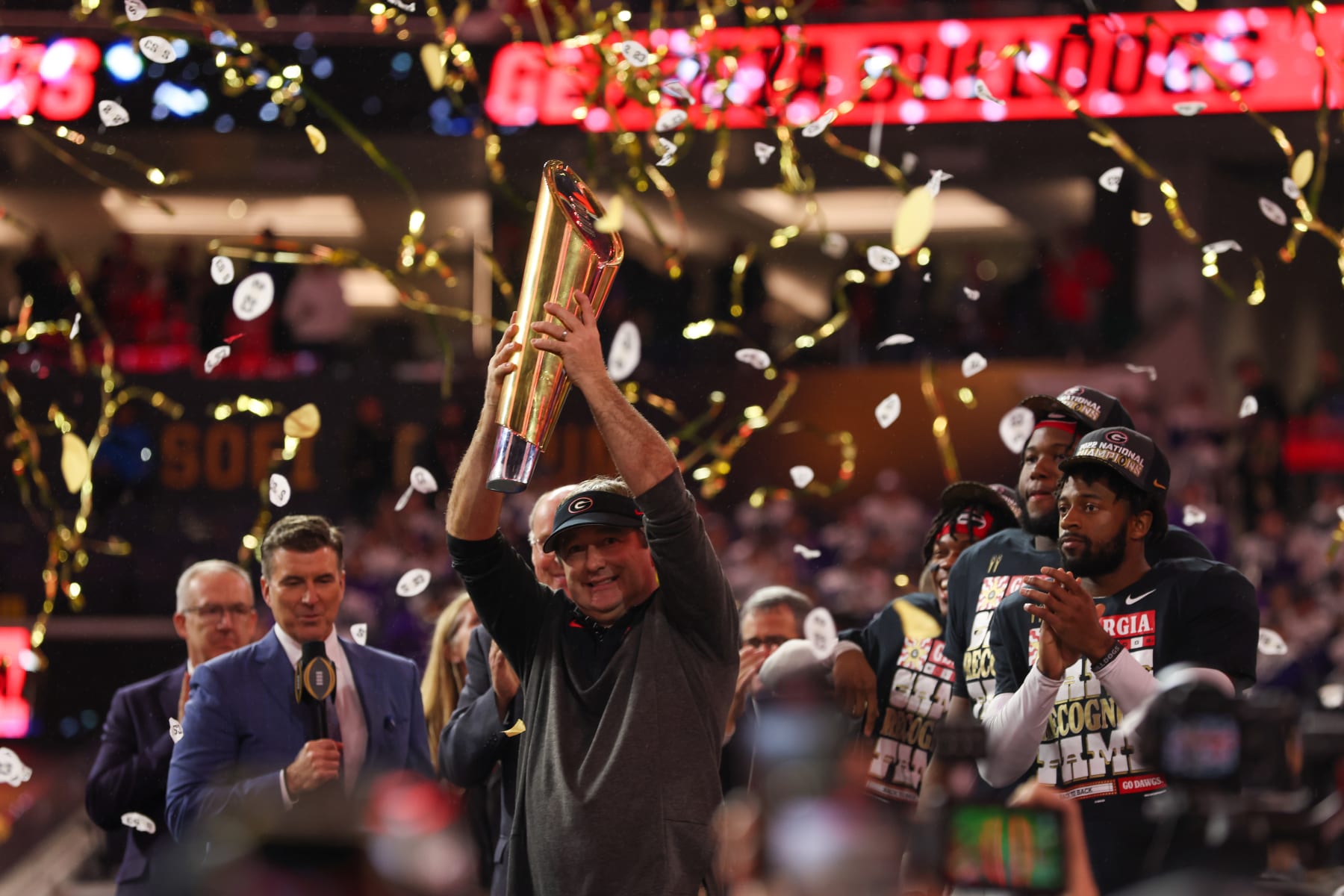 INGLEWOOD, CA - JANUARY 09: Georgia Bulldogs head coach Kirby Smart holds up the trophy following the Georgia Bulldogs game versus the TCU Horned Frogs in the College Football Playoff National Championship game on January 9, 2023, at SoFi Stadium in Inglewood, CA. (Photo by Jordon Kelly/Icon Sportswire via Getty Images)