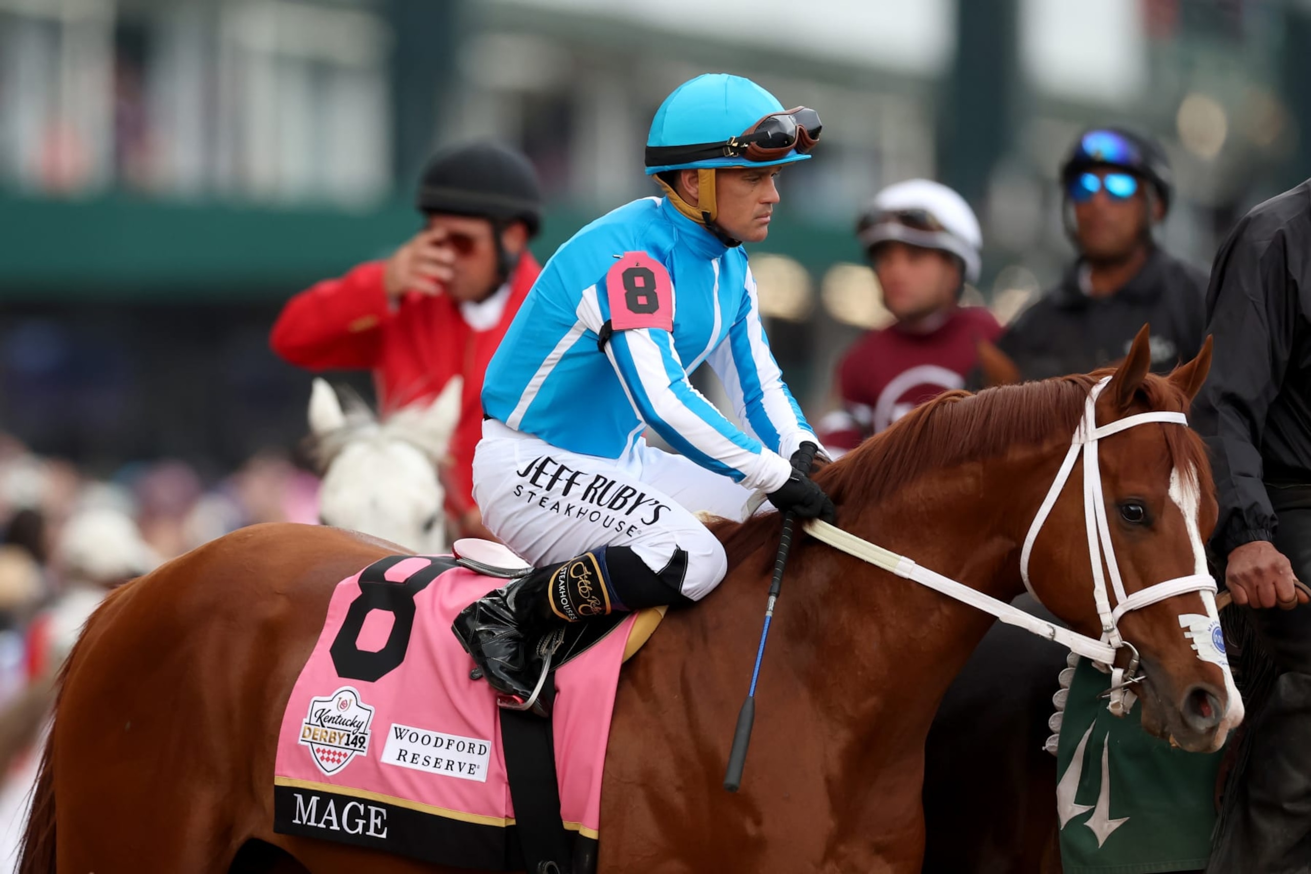 LOUISVILLE, KENTUCKY - MAY 06: Jockey Javier Castellano leads Mage #8 to the starting gate before the 149th Kentucky Derby at Churchill Downs on May 06, 2023 in Louisville, Kentucky. (Photo by Rob Carr/Getty Images) LOUISVILLE, KENTUCKY - MAY 06: Jockey Javier Castellano leads Mage #8 to the starting gate before the 149th Kentucky Derby at Churchill Downs on May 06, 2023 in Louisville, Kentucky. (Photo by Rob Carr/Getty Images)