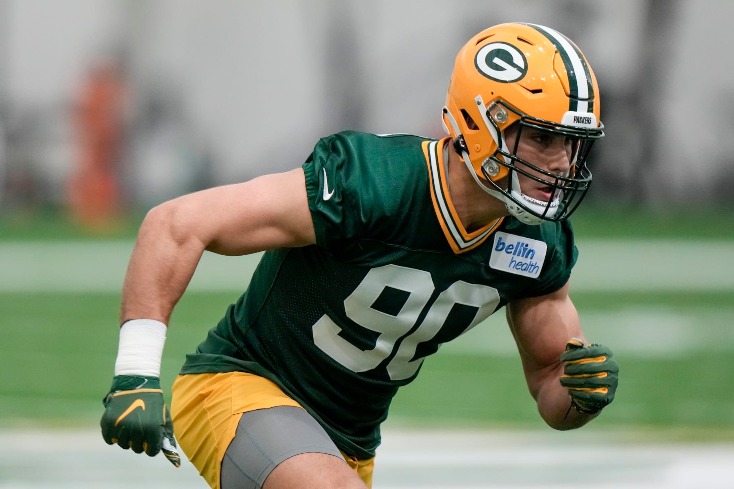 Green Bay Packers' Lukas Van Ness runs a drill during an NFL football rookie mini camp practice session Friday, May 5, 2023, in Green Bay, Wis. (AP Photo/Morry Gash)
