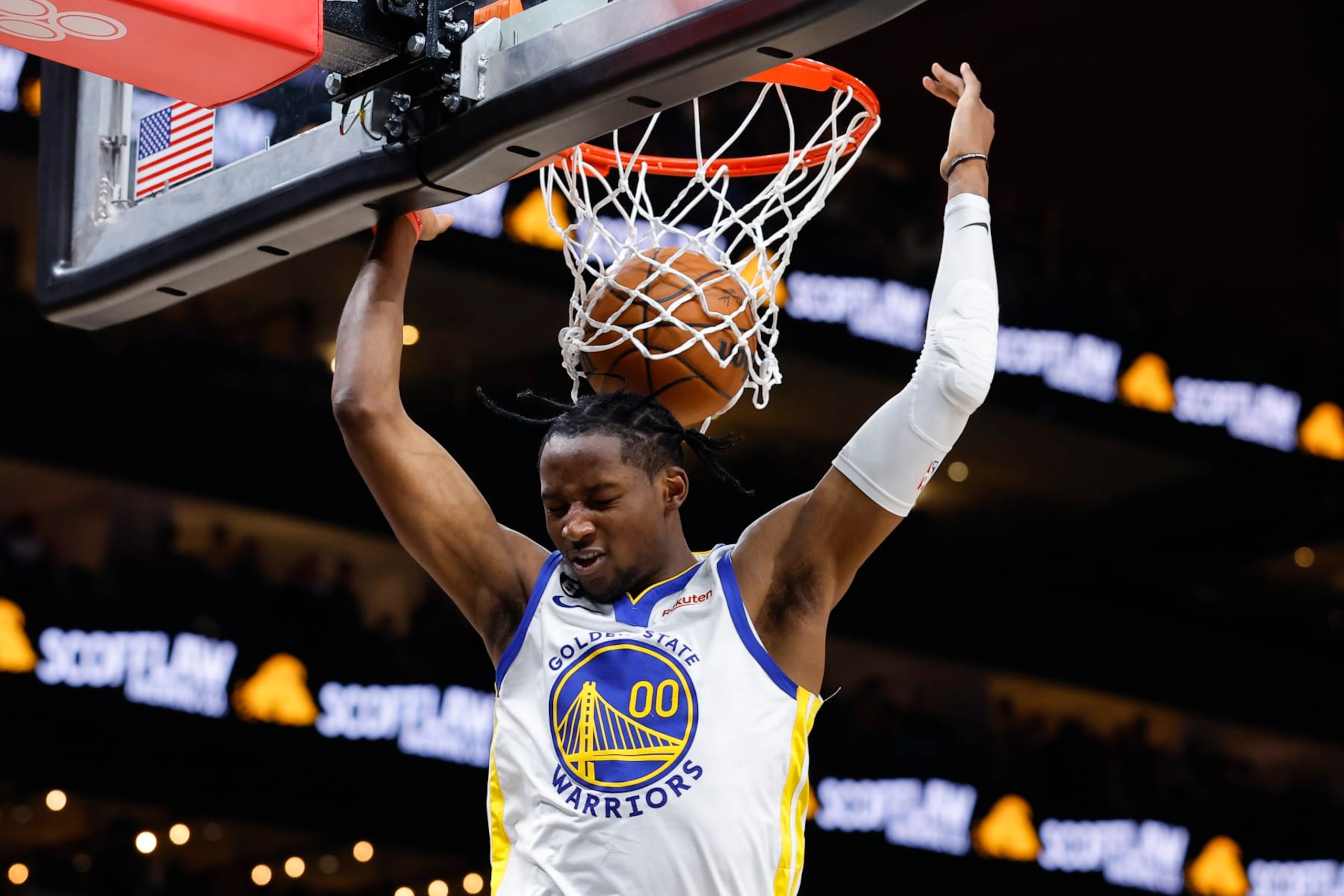 ATLANTA, GA - MARCH 17: Jonathan Kuminga #00 of the Golden State Warriors dunks during the second half against the Atlanta Hawks at State Farm Arena on March 17, 2023 in Atlanta, Georgia. NOTE TO USER: User expressly acknowledges and agrees that, by downloading and or using this photograph, User is consenting to the terms and conditions of the Getty Images License Agreement. (Photo by Todd Kirkland/Getty Images)