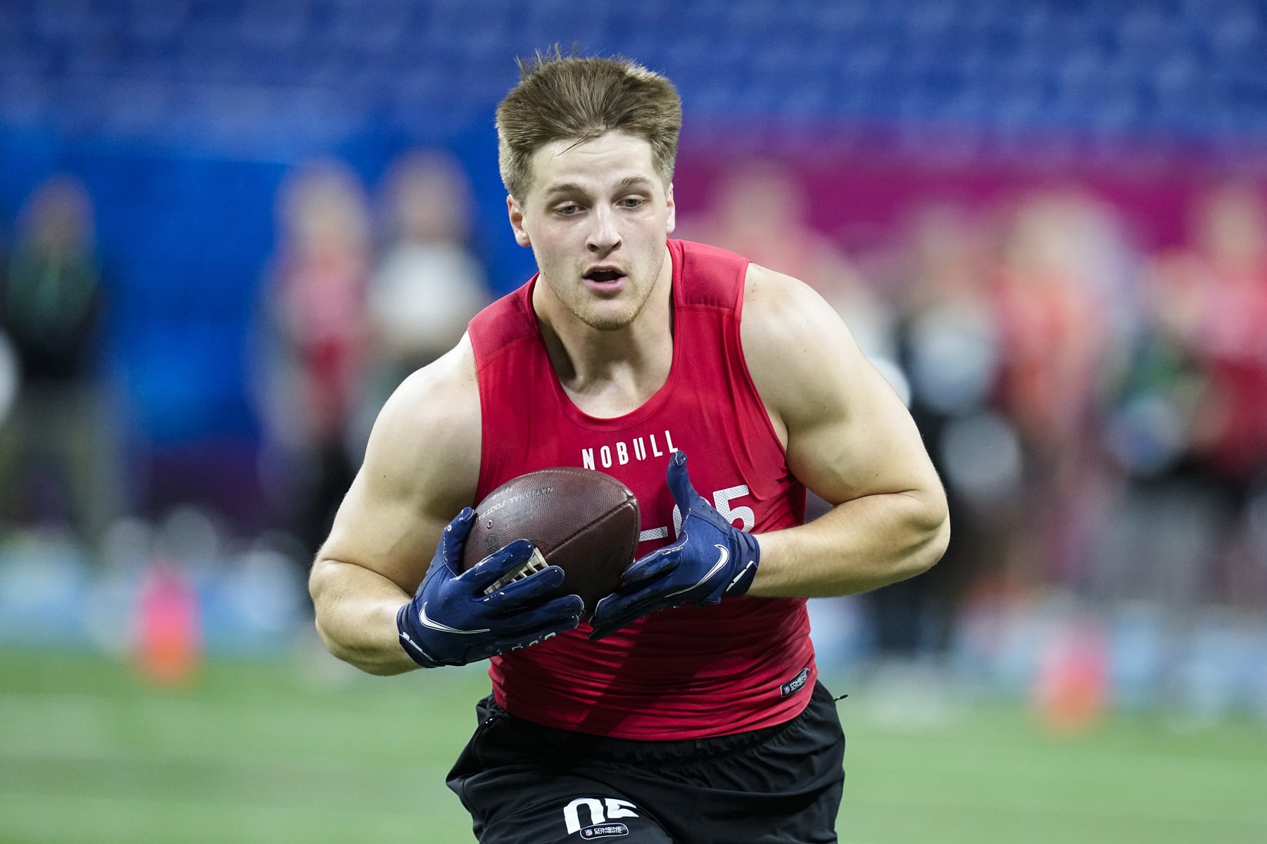 South Dakota State tight end Tucker Kraft runs a drill at the NFL football scouting combine in Indianapolis, Saturday, March 4, 2023. (AP Photo/Darron Cummings)