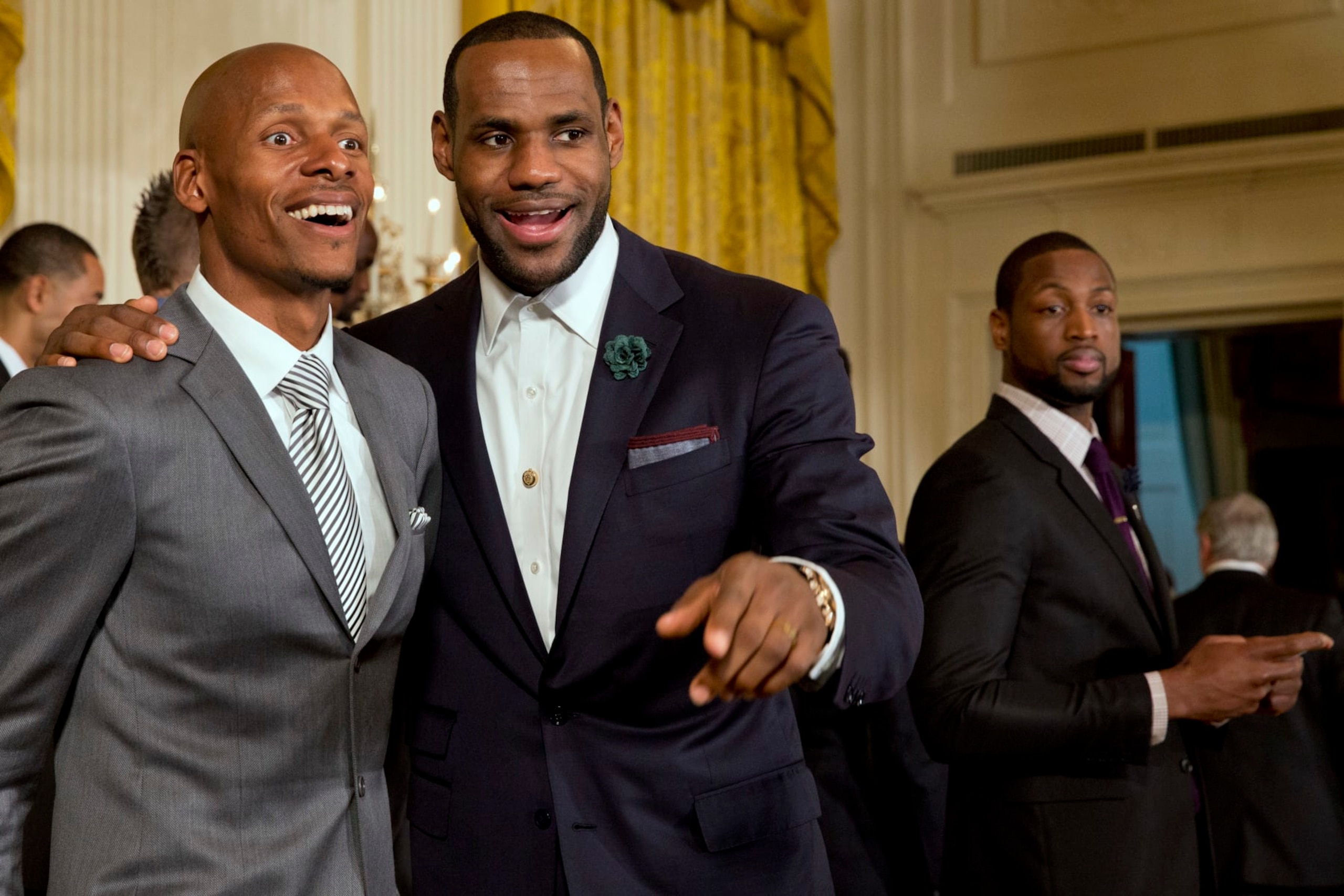 Miami Heat basketball players Ray Allen, left, and LeBron James look out into the crowd, next to Dwyane Wade, after a ceremony in the East Room of the White House in Washington, Tuesday, Jan. 14, 2014, where President Barack Obama honored the Miami Heat 2013 NBA Champion basketball team. (AP Photo/Jacquelyn Martin) Miami Heat basketball players Ray Allen, left, and LeBron James look out into the crowd, next to Dwyane Wade, after a ceremony in the East Room of the White House in Washington, Tuesday, Jan. 14, 2014, where President Barack Obama honored the Miami Heat 2013 NBA Champion basketball team. (AP Photo/Jacquelyn Martin)