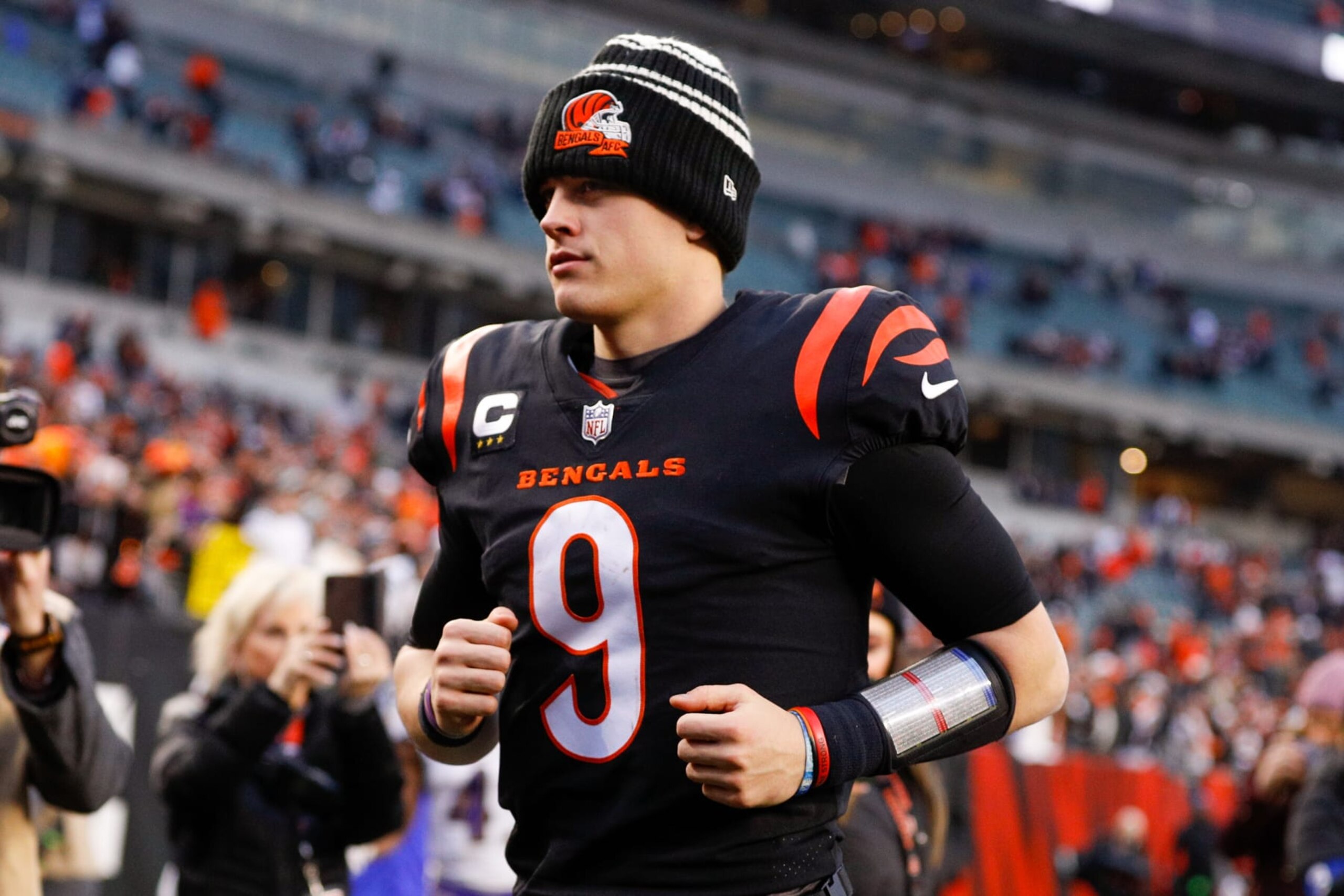 CINCINNATI, OH - JANUARY 08: Cincinnati Bengals quarterback Joe Burrow (9) runs off the field after the game against the Baltimore Ravens and the Cincinnati Bengals on January 8, 2023, at Paycor Stadium in Cincinnati, OH. (Photo by Ian Johnson/Icon Sportswire via Getty Images)