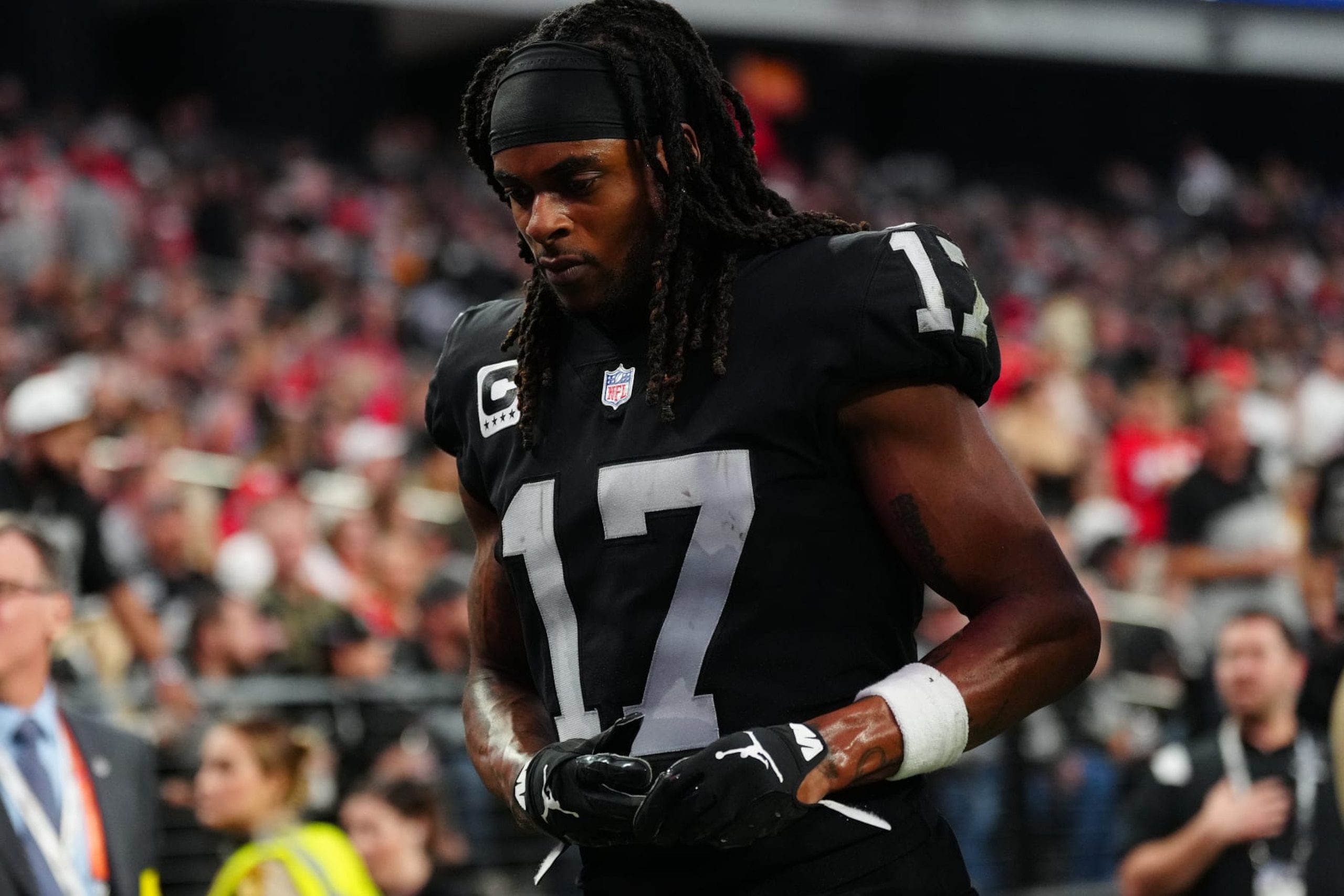 LAS VEGAS, NEVADA - JANUARY 07: Wide receiver Davante Adams #17 of the Las Vegas Raiders runs off the field during halftime against the Kansas City Chiefs at Allegiant Stadium on January 07, 2023 in Las Vegas, Nevada. The Chiefs defeated the Raiders 31-13. (Photo by Jeff Bottari/Getty Images)