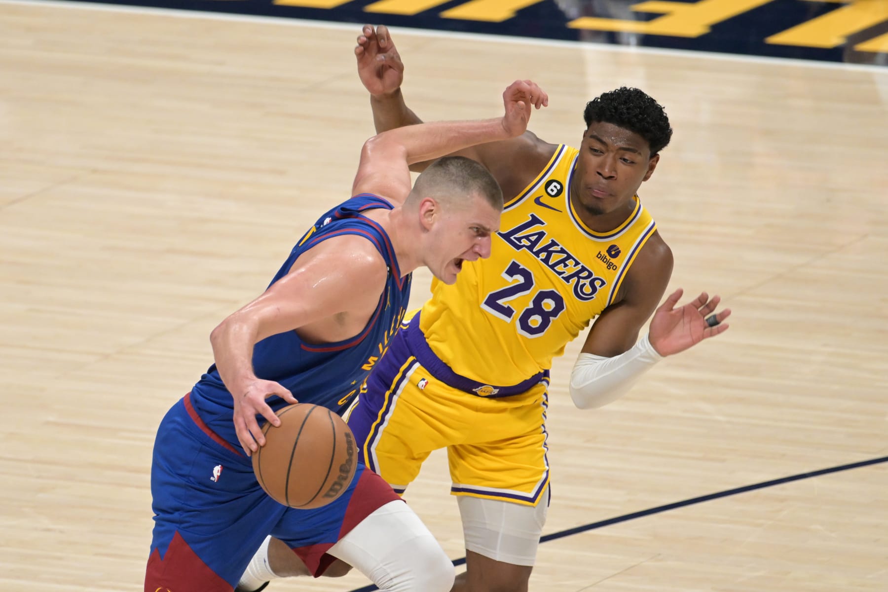 DENVER, CO - MAY 16 : Rui Hachimura (28) of the Los Angeles Lakers fouls Nikola Jokic (15) of the Denver Nuggets during 1st game of Western Conference Final at Ball Arena in Denver, Colorado on Tuesday, May 16, 2023. (Photo by Hyoung Chang/The Denver Post)