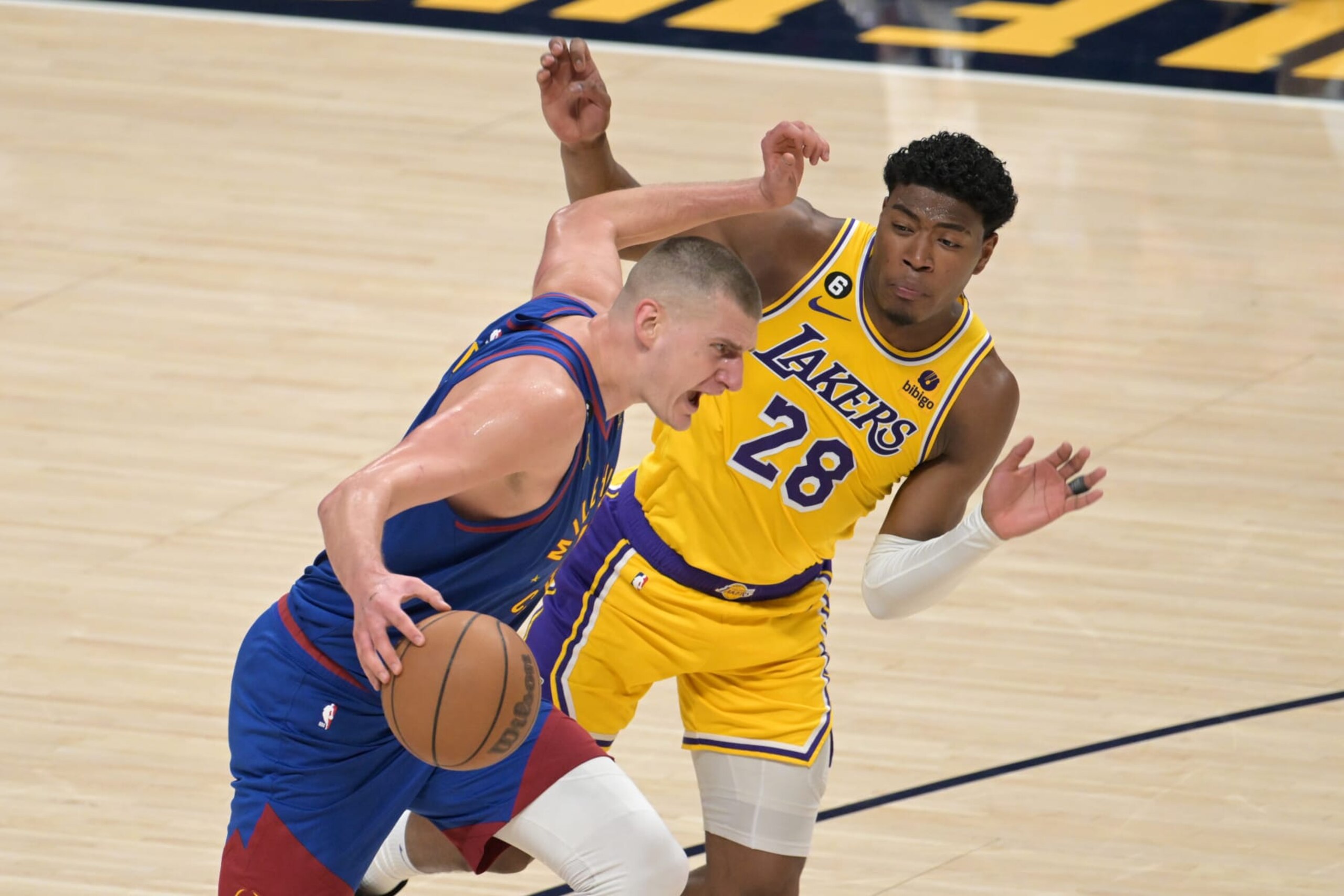 DENVER, CO - MAY 16 : Rui Hachimura (28) of the Los Angeles Lakers fouls Nikola Jokic (15) of the Denver Nuggets during 1st game of Western Conference Final at Ball Arena in Denver, Colorado on Tuesday, May 16, 2023. (Photo by Hyoung Chang/The Denver Post)