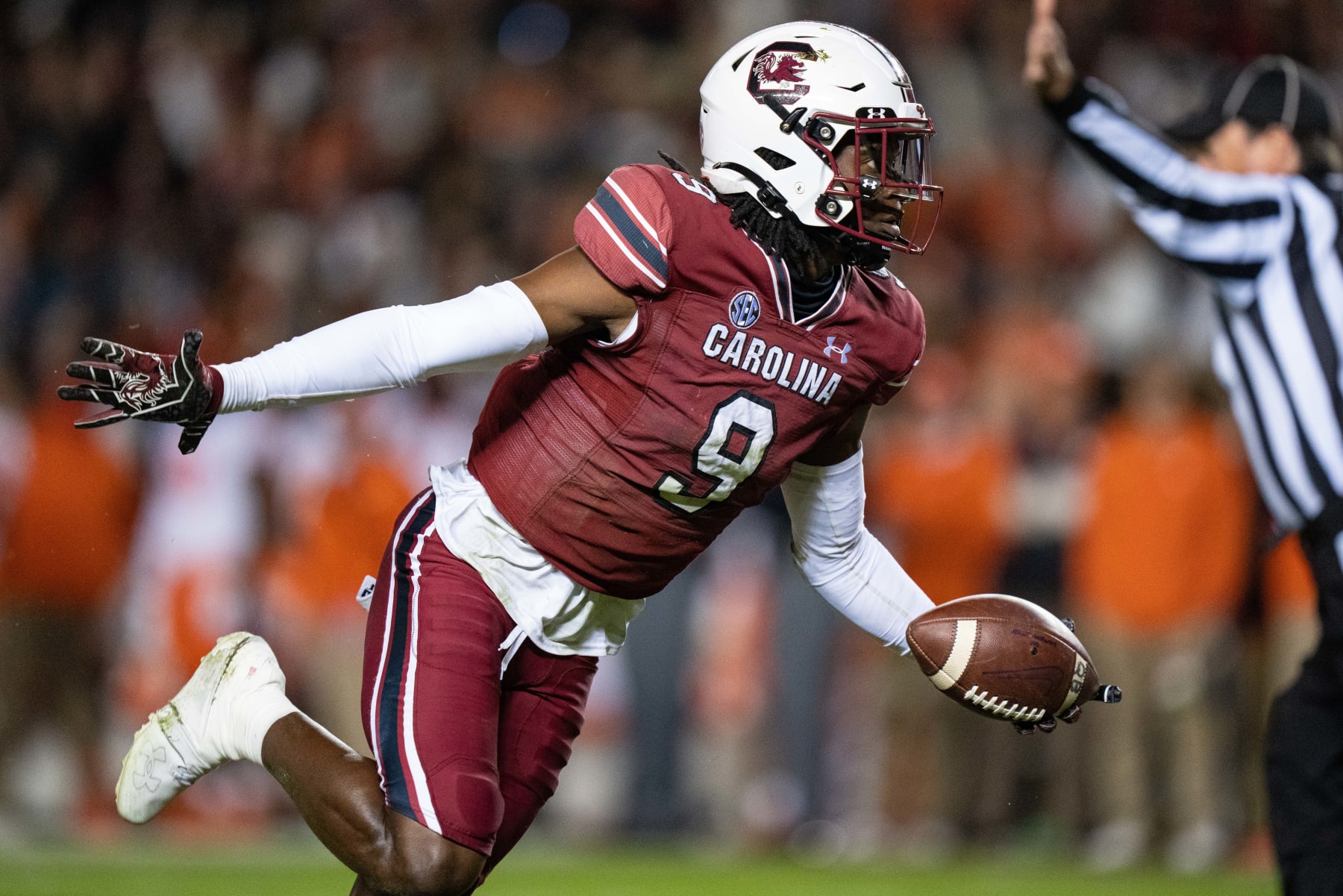 COLUMBIA, SOUTH CAROLINA - NOVEMBER 27: Defensive back Cam Smith #9 of the South Carolina Gamecocks reacts after making an interception against the Clemson Tigers in the first quarter during their game at Williams-Brice Stadium on November 27, 2021 in Columbia, South Carolina. (Photo by Jacob Kupferman/Getty Images)