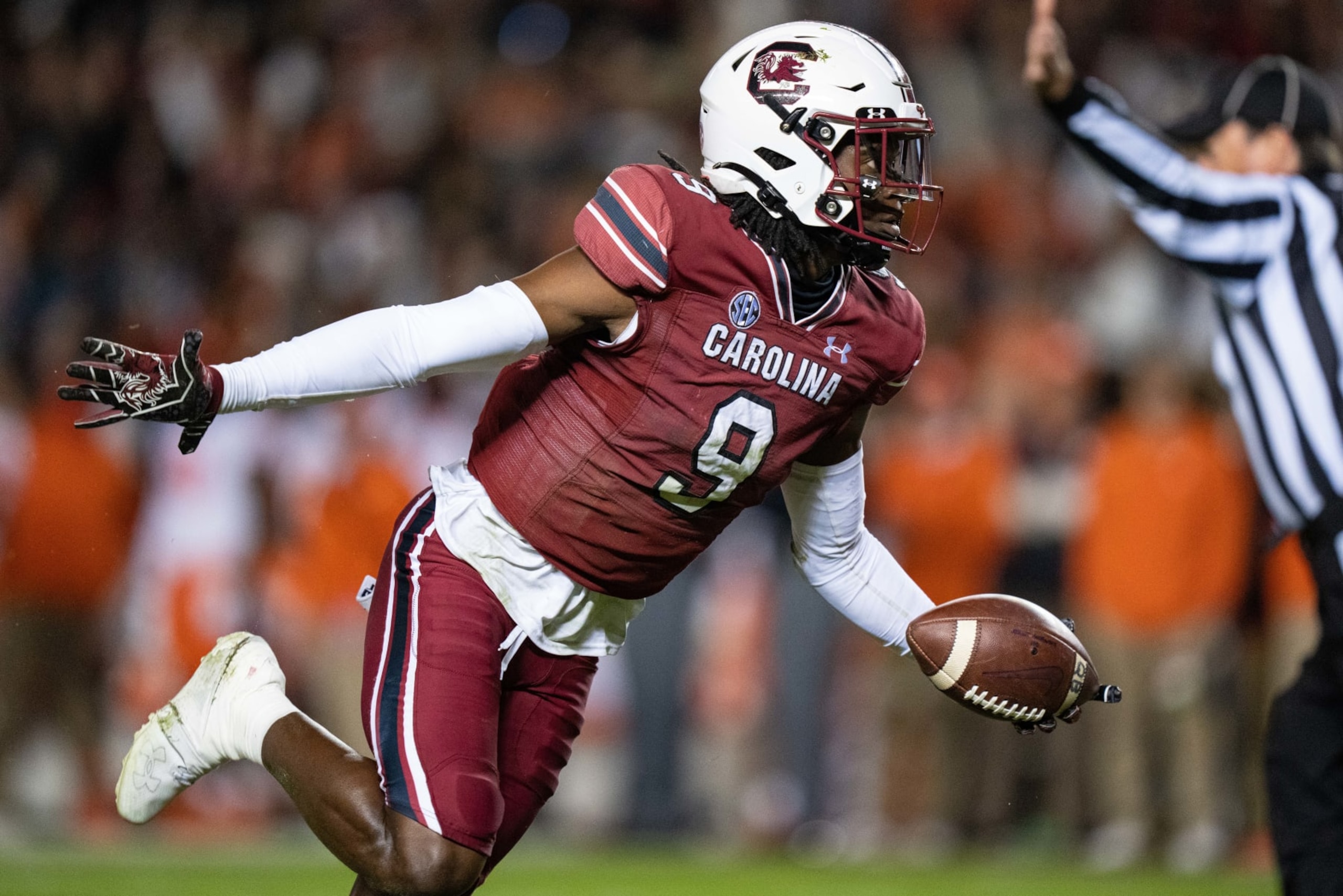 COLUMBIA, SOUTH CAROLINA - NOVEMBER 27: Defensive back Cam Smith #9 of the South Carolina Gamecocks reacts after making an interception against the Clemson Tigers in the first quarter during their game at Williams-Brice Stadium on November 27, 2021 in Columbia, South Carolina. (Photo by Jacob Kupferman/Getty Images)