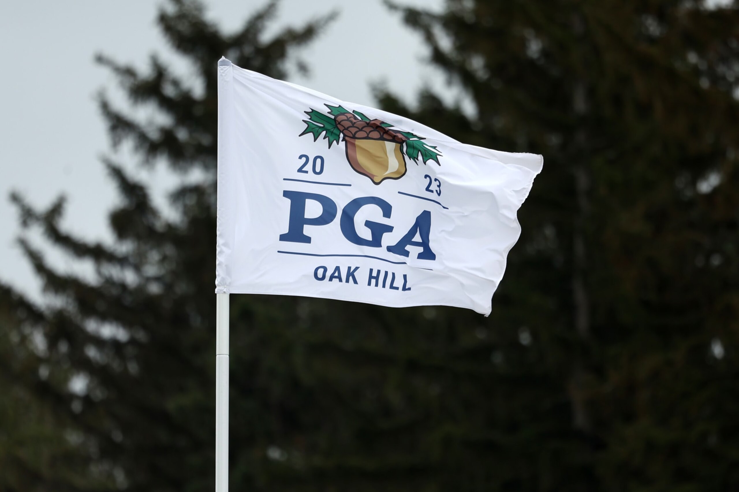 ROCHESTER, NEW YORK - MAY 17: A PGA Championship flag blows in the breeze during a practice round prior to the 2023 PGA Championship at Oak Hill Country Club on May 17, 2023 in Rochester, New York. (Photo by Maddie Meyer/PGA of America via Getty Images) ROCHESTER, NEW YORK - MAY 17: A PGA Championship flag blows in the breeze during a practice round prior to the 2023 PGA Championship at Oak Hill Country Club on May 17, 2023 in Rochester, New York. (Photo by Maddie Meyer/PGA of America via Getty Images)