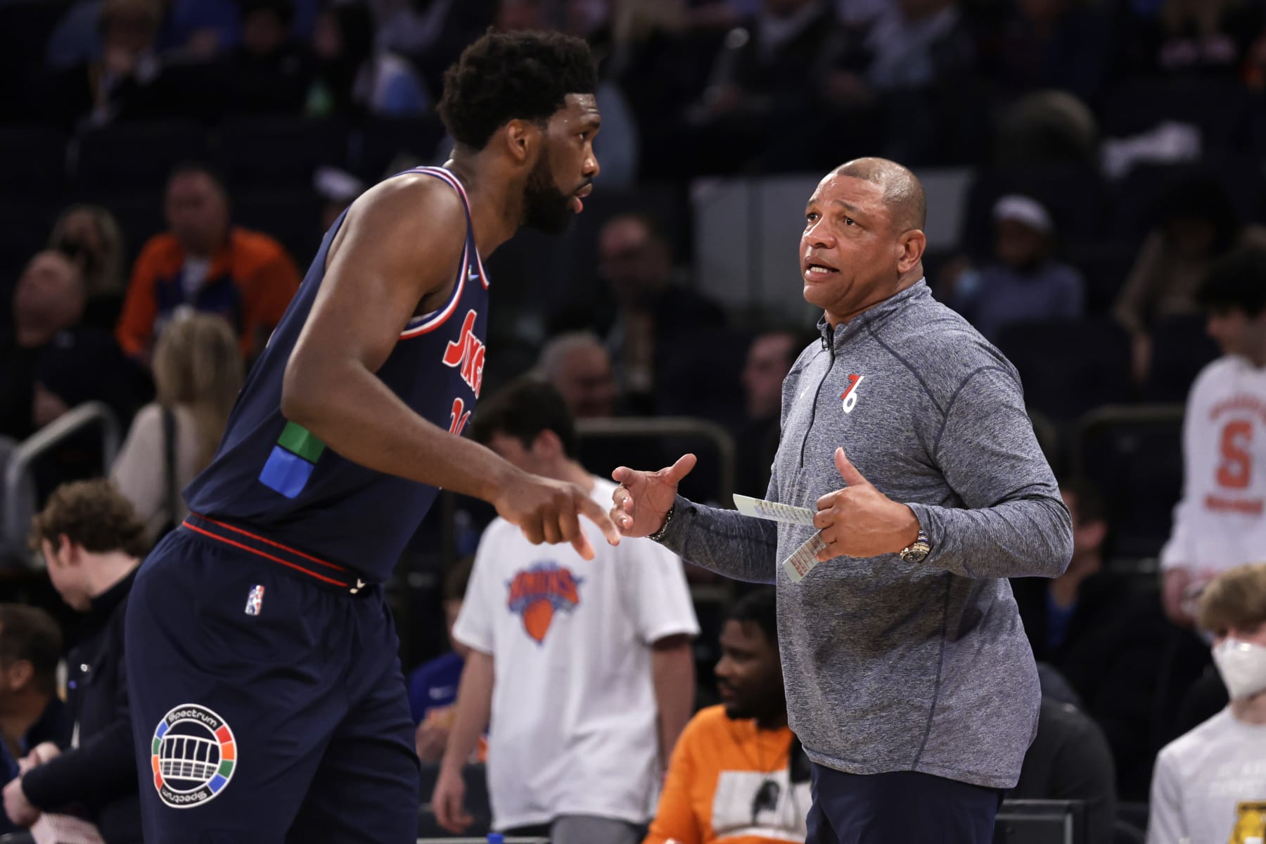 NEW YORK, NEW YORK - FEBRUARY 27: Joel Embiid #21 of the Philadelphia 76ers talks with Doc Rivers head coach of the Philadelphia 76ers against the New York Knicks during the second half at Madison Square Garden on February 27, 2022 in New York City. Philadelphia 76ers won 125-109. NOTE TO USER: User expressly acknowledges and agrees that, by downloading and or using this Photograph, user is consenting to the terms and conditions of the Getty Images License Agreement. (Photo by Adam Hunger/Getty Images)