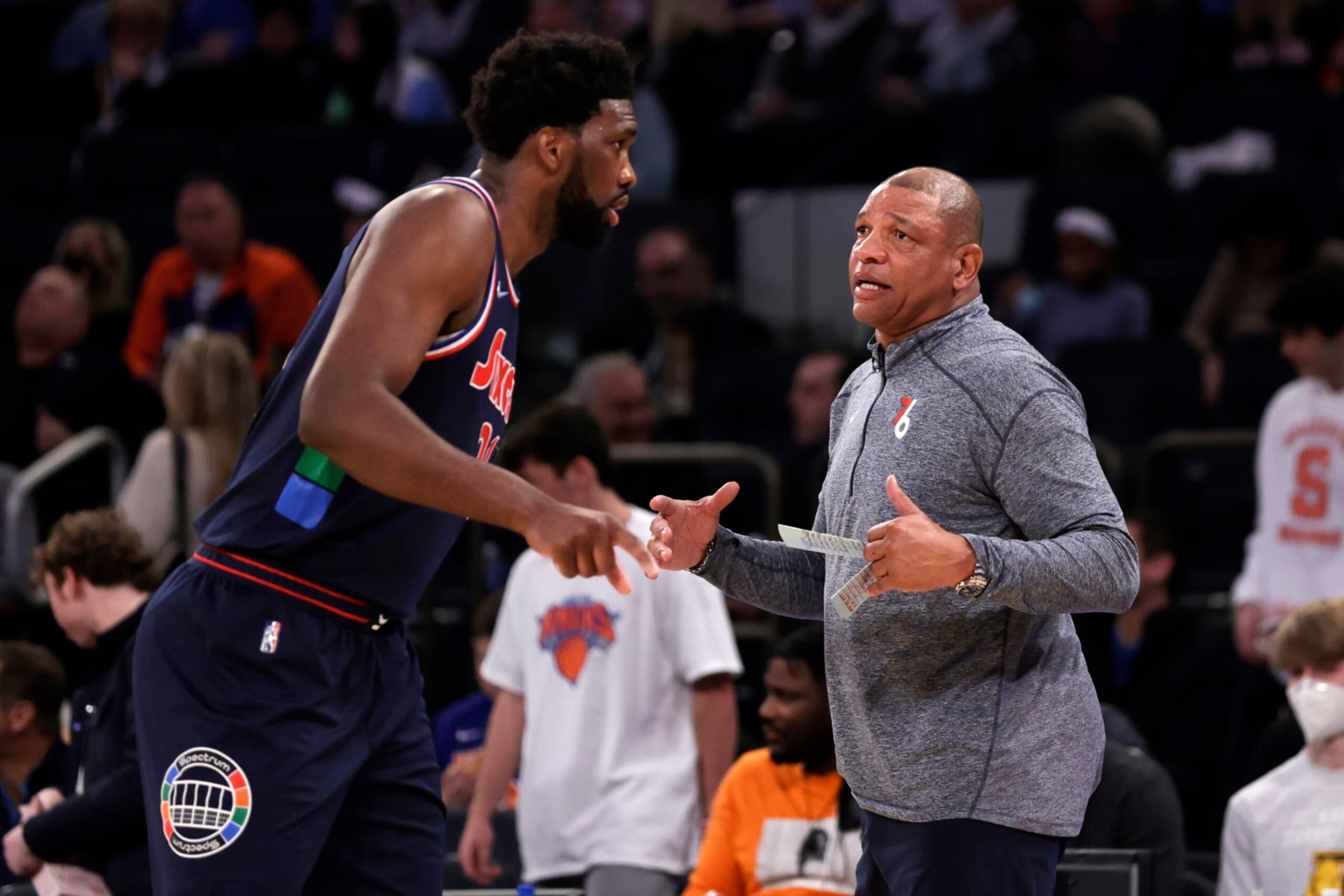 NEW YORK, NEW YORK - FEBRUARY 27: Joel Embiid #21 of the Philadelphia 76ers talks with Doc Rivers head coach of the Philadelphia 76ers against the New York Knicks during the second half at Madison Square Garden on February 27, 2022 in New York City. Philadelphia 76ers won 125-109. NOTE TO USER: User expressly acknowledges and agrees that, by downloading and or using this Photograph, user is consenting to the terms and conditions of the Getty Images License Agreement. (Photo by Adam Hunger/Getty Images)