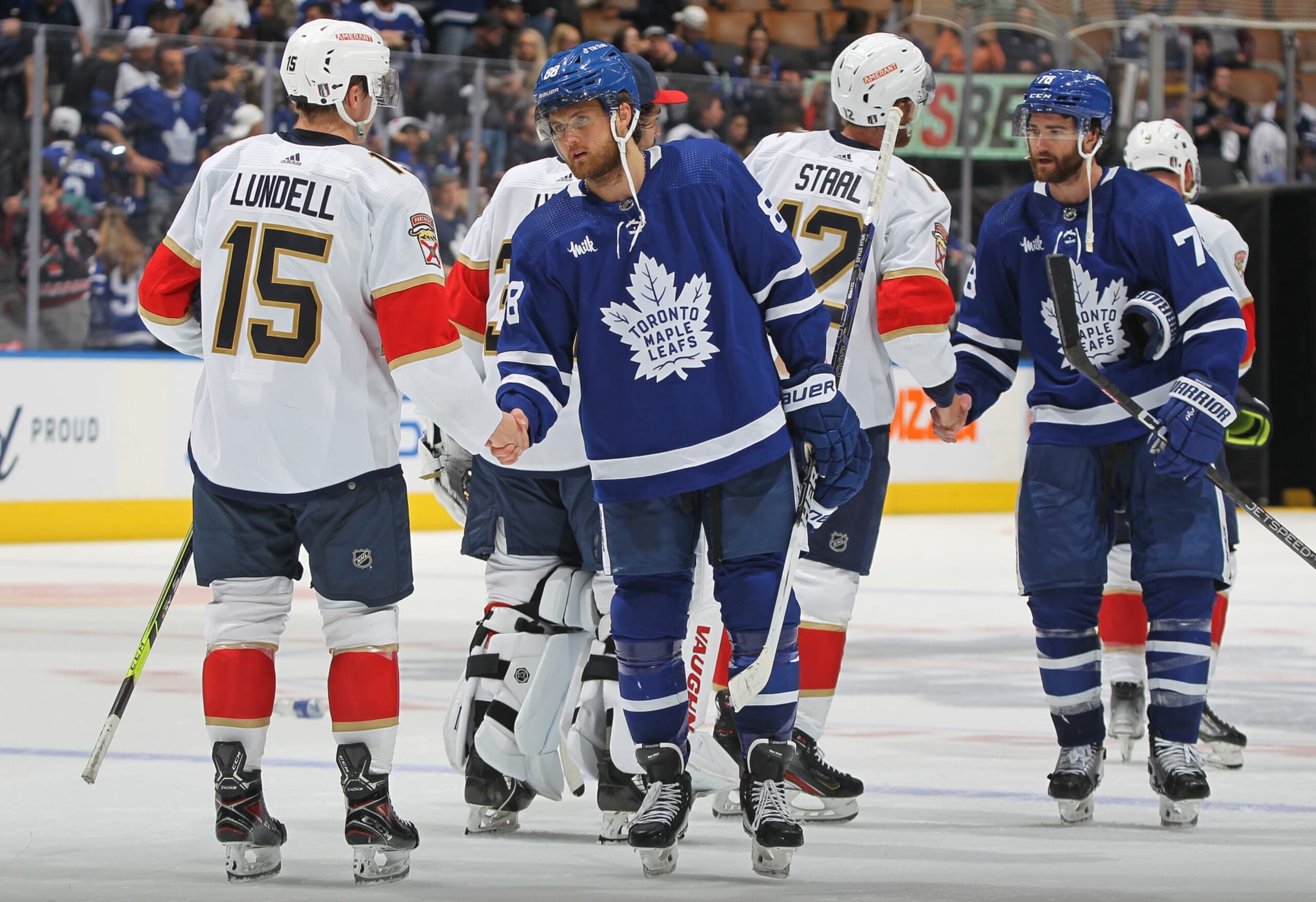 Toronto Maple Leafs congratulate the Florida Panthers following the latter's second-round series victory. 