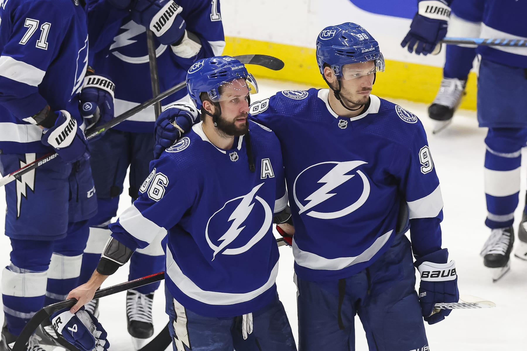TAMPA, FL - APRIL 29: Nikita Kucherov #86 and Mikhail Sergachev #98 of the Tampa Bay Lightning after the game against the Toronto Maple Leafs in Game Six of the First Round of the 2023 Stanley Cup Playoffs at Amalie Arena on April 29, 2023 in Tampa, Florida. (Photo by Mike Carlson/NHLI via Getty Images)