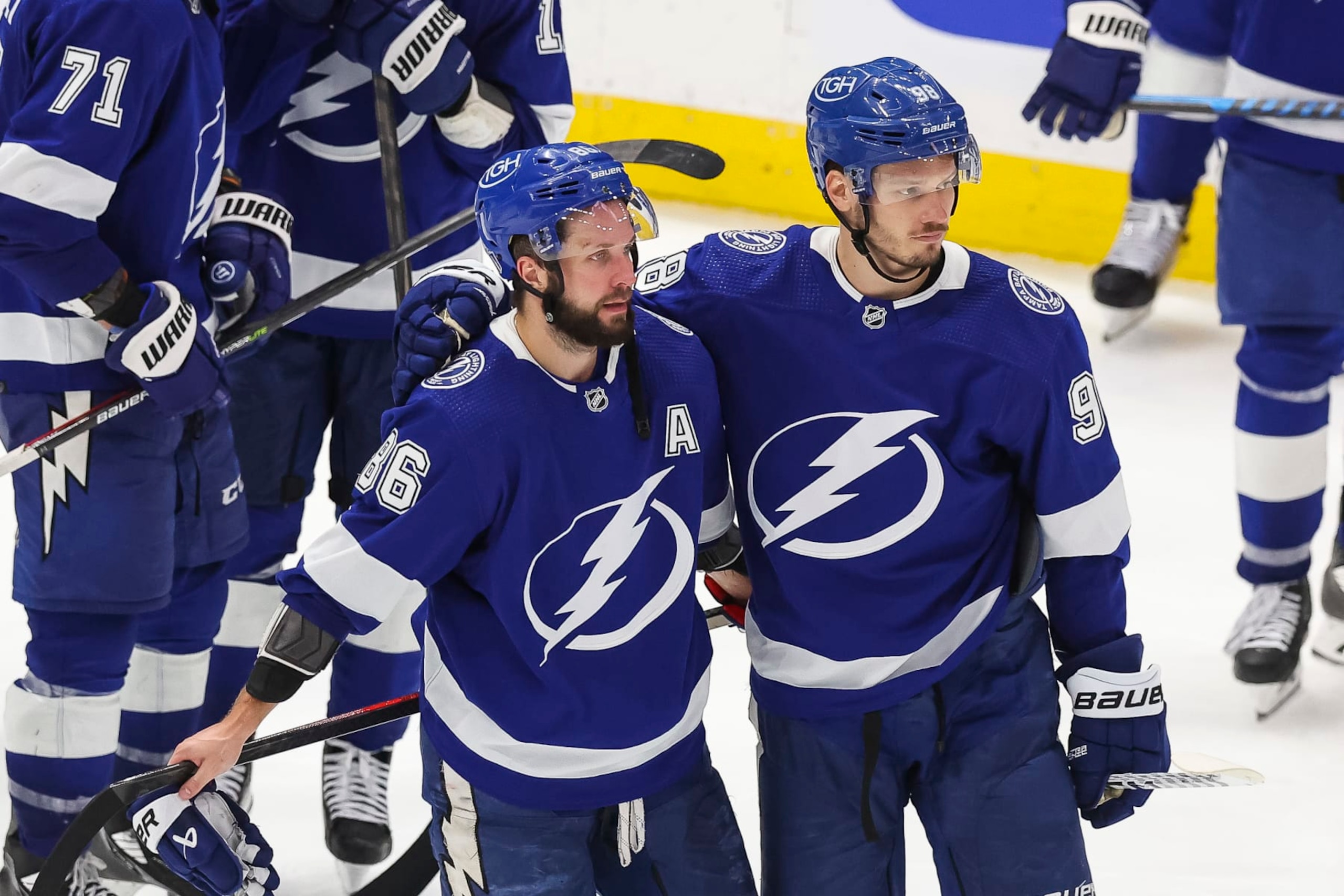 TAMPA, FL - APRIL 29: Nikita Kucherov #86 and Mikhail Sergachev #98 of the Tampa Bay Lightning after the game against the Toronto Maple Leafs in Game Six of the First Round of the 2023 Stanley Cup Playoffs at Amalie Arena on April 29, 2023 in Tampa, Florida. (Photo by Mike Carlson/NHLI via Getty Images)