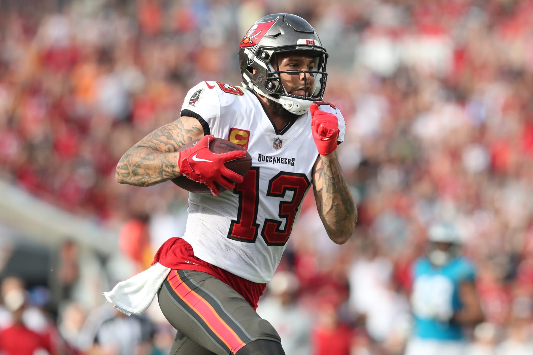 TAMPA, FL - JANUARY 01: Tampa Bay Buccaneers wide receiver Mike Evans (13) hauls in a long pass for a touchdown during the regular season game between the Carolina Panthers and the Tampa Bay Buccaneers on January 01, 2023 at Raymond James Stadium in Tampa, Florida. (Photo by Cliff Welch/Icon Sportswire via Getty Images)