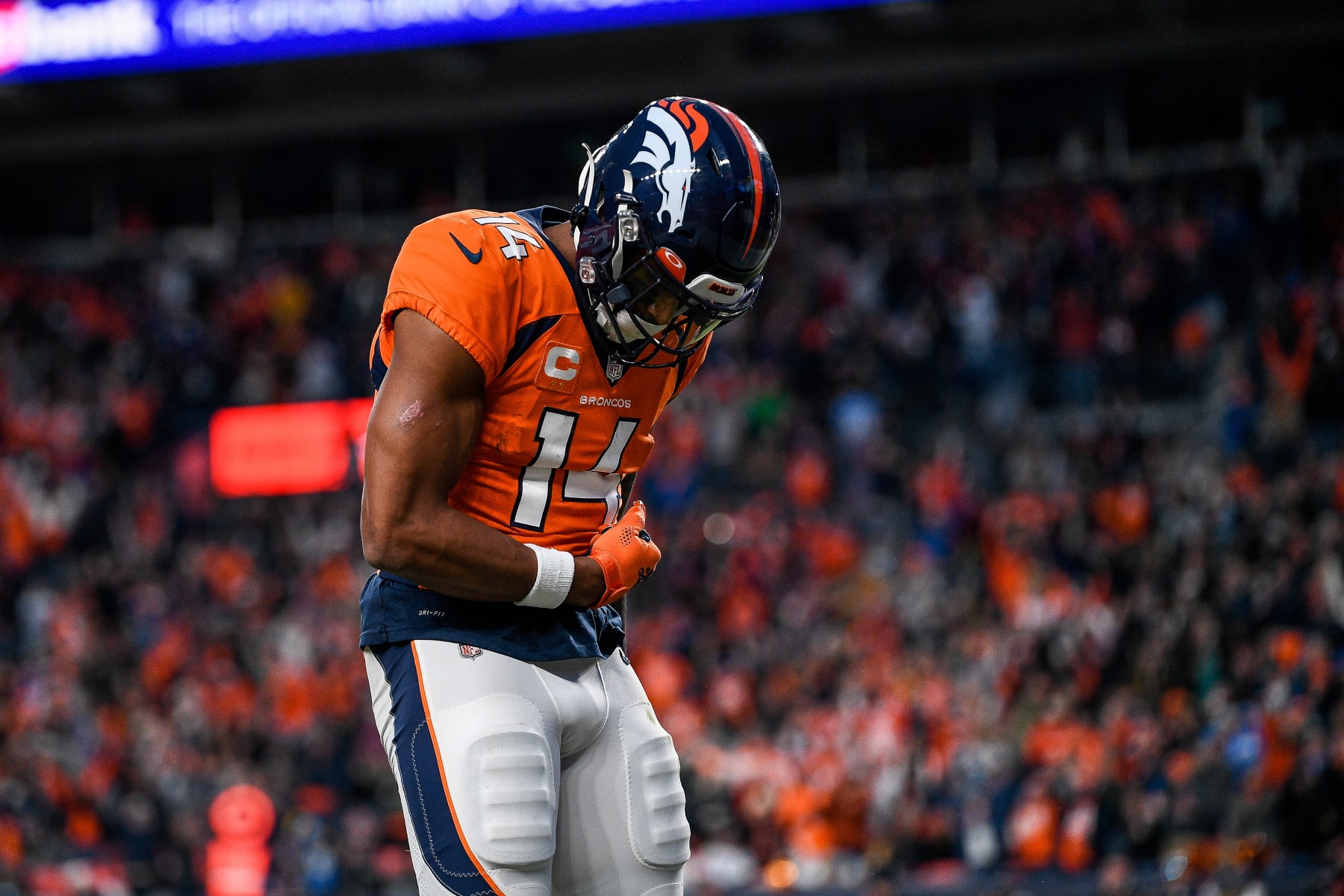 DENVER, CO - JANUARY 8: Denver Broncos wide receiver Courtland Sutton (14) celebrates after a fourth quarter touchdown during a game between the Los Angeles Chargers and the Denver Broncos at Empower Field at Mile High on January 8, 2023 in Denver, Colorado. (Photo by Dustin Bradford/Icon Sportswire via Getty Images)
