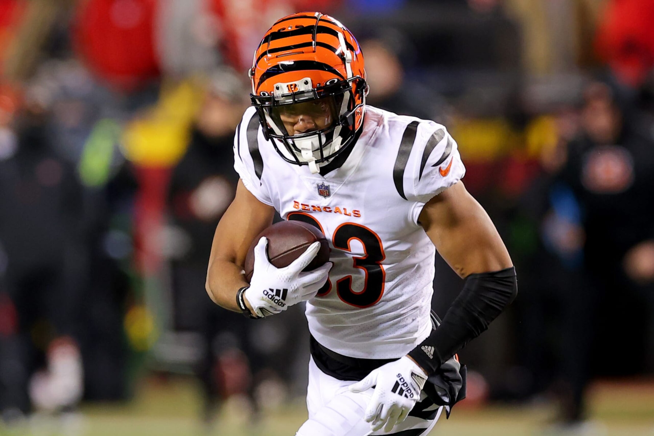 KANSAS CITY, MISSOURI - JANUARY 29: Tyler Boyd #83 of the Cincinnati Bengals carries the ball against the Kansas City Chiefs during the second quarter in the AFC Championship Game at GEHA Field at Arrowhead Stadium on January 29, 2023 in Kansas City, Missouri. (Photo by Kevin C. Cox/Getty Images)