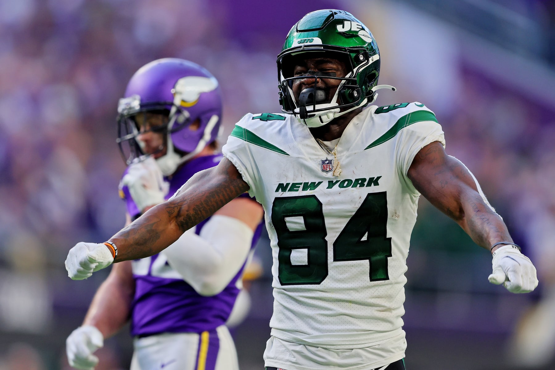 MINNEAPOLIS, MINNESOTA - DECEMBER 04: Corey Davis #84 of the New York Jets celebrates after a catch during the fourth quarter against the Minnesota Vikings at U.S. Bank Stadium on December 04, 2022 in Minneapolis, Minnesota. (Photo by Adam Bettcher/Getty Images)