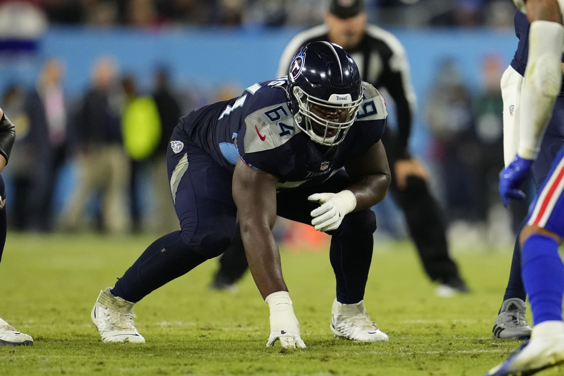 NASHVILLE, TENNESSEE - OCTOBER 18: Nate Davis #64 of the Tennessee Titans gets set during to an NFL game against the Buffalo Bills at Nissan Stadium on October 18, 2021 in Nashville, Tennessee. (Photo by Cooper Neill/Getty Images)