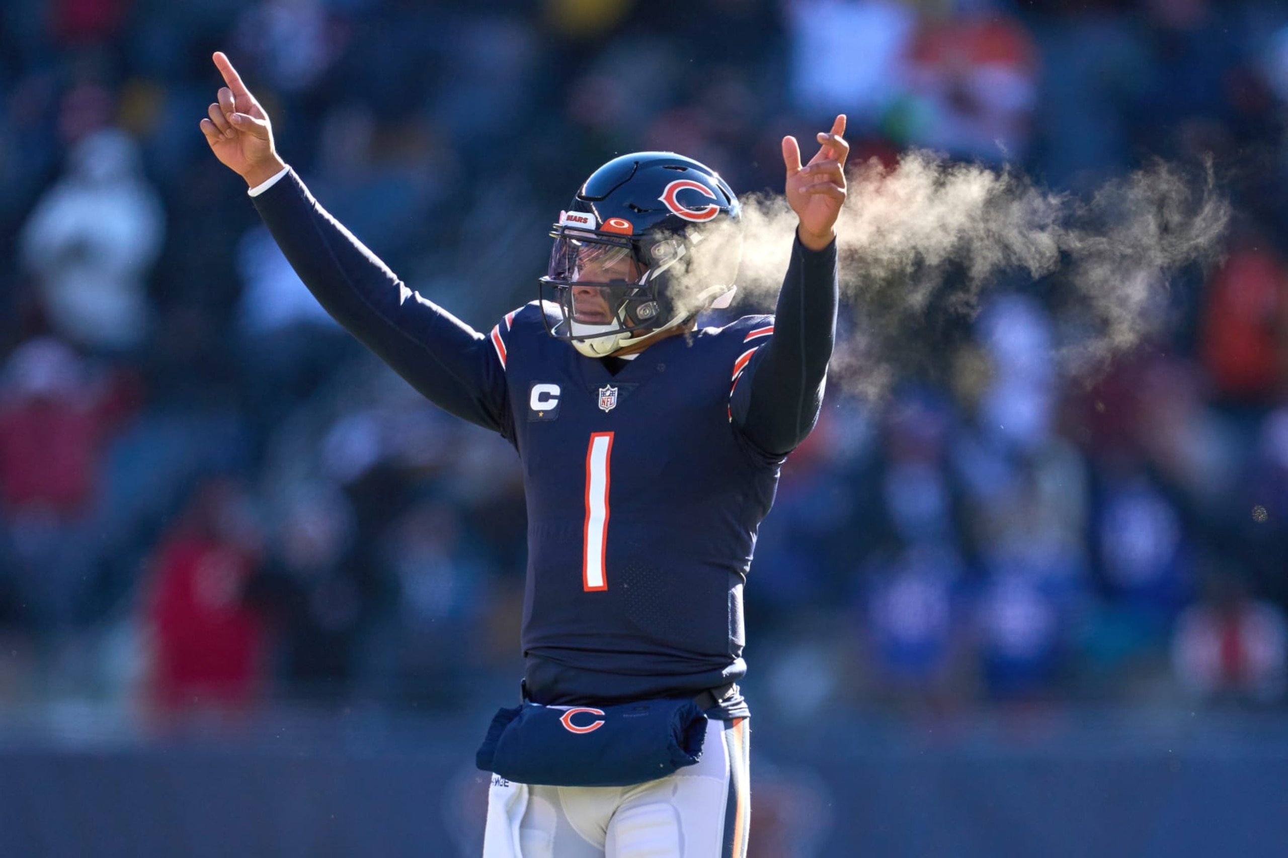 CHICAGO, IL - DECEMBER 24: Chicago Bears quarterback Justin Fields (1) celebrate after a touchdown play in action during a game between the Buffalo Bills and the Chicago Bears on December 24, 2022, at Soldier Field in Chicago, IL. (Photo by Robin Alam/Icon Sportswire via Getty Images)