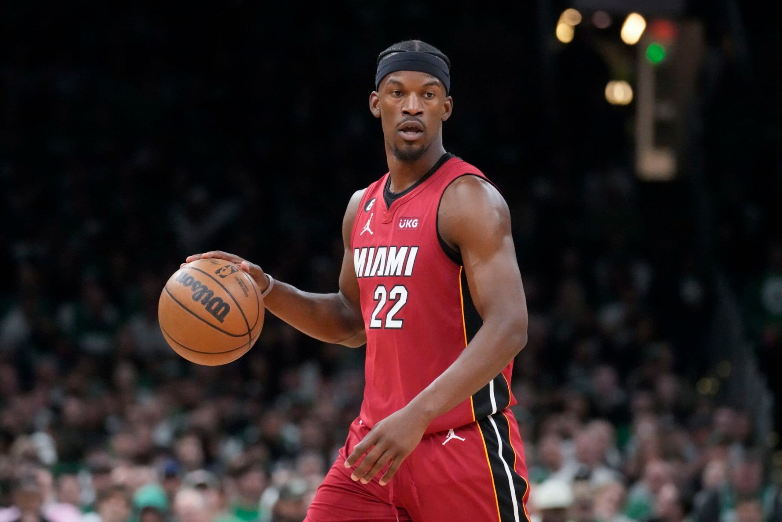 Miami Heat forward Jimmy Butler (22) moves the ball down court in the first half of game 1 of the NBA basketball Eastern Conference finals playoff series against the Boston Celtics in Boston, Wednesday, May 17, 2023. (AP Photo/Charles Krupa) Miami Heat forward Jimmy Butler (22) moves the ball down court in the first half of game 1 of the NBA basketball Eastern Conference finals playoff series against the Boston Celtics in Boston, Wednesday, May 17, 2023. (AP Photo/Charles Krupa)