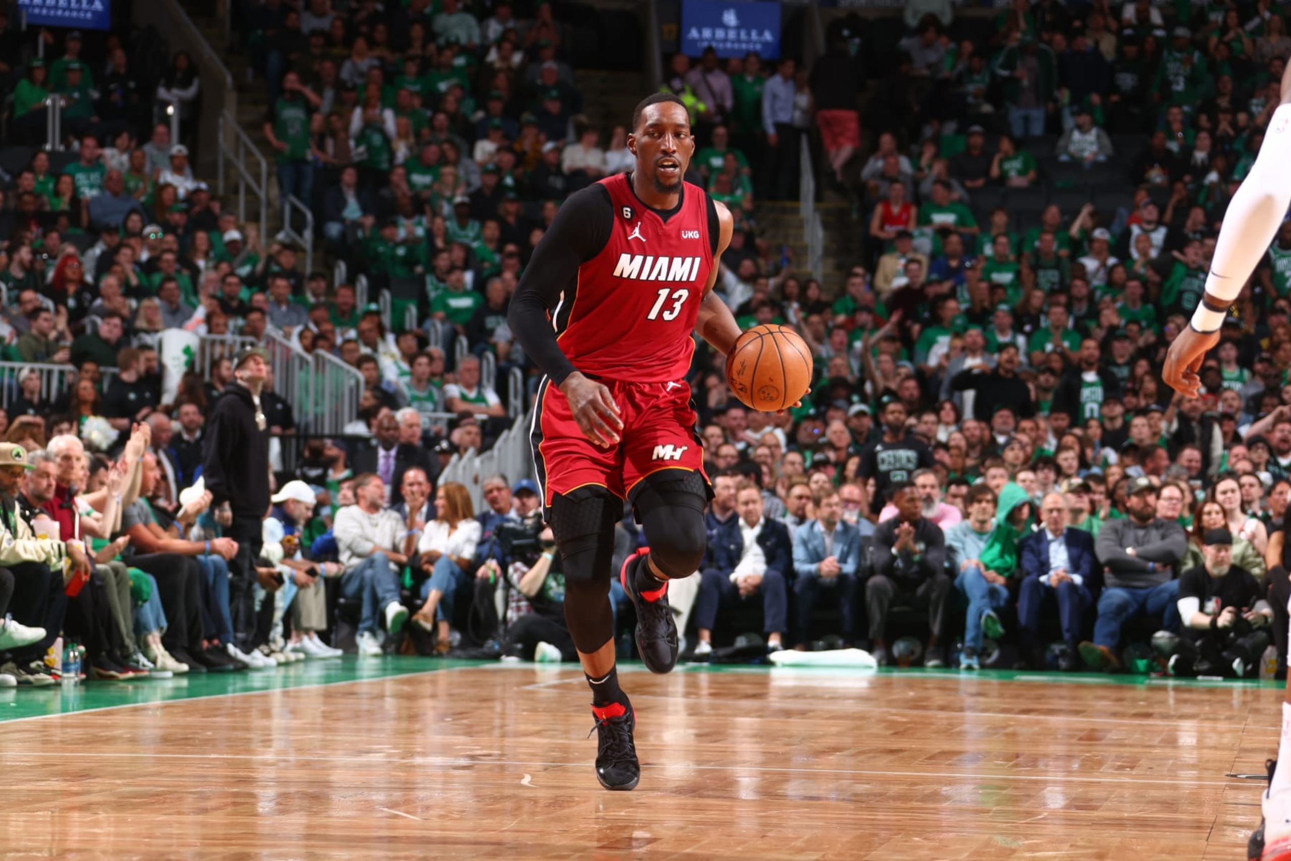 BOSTON, MA - MAY 17: Bam Adebayo #13 of the Miami Heat dribbles the ball during Game One of the Eastern Conference Finals against the Boston Celtics on May 17, 2023 at the TD Garden in Boston, Massachusetts. NOTE TO USER: User expressly acknowledges and agrees that, by downloading and or using this photograph, User is consenting to the terms and conditions of the Getty Images License Agreement. Mandatory Copyright Notice: Copyright 2023 NBAE  (Photo by Nathaniel S. Butler/NBAE via Getty Images)
