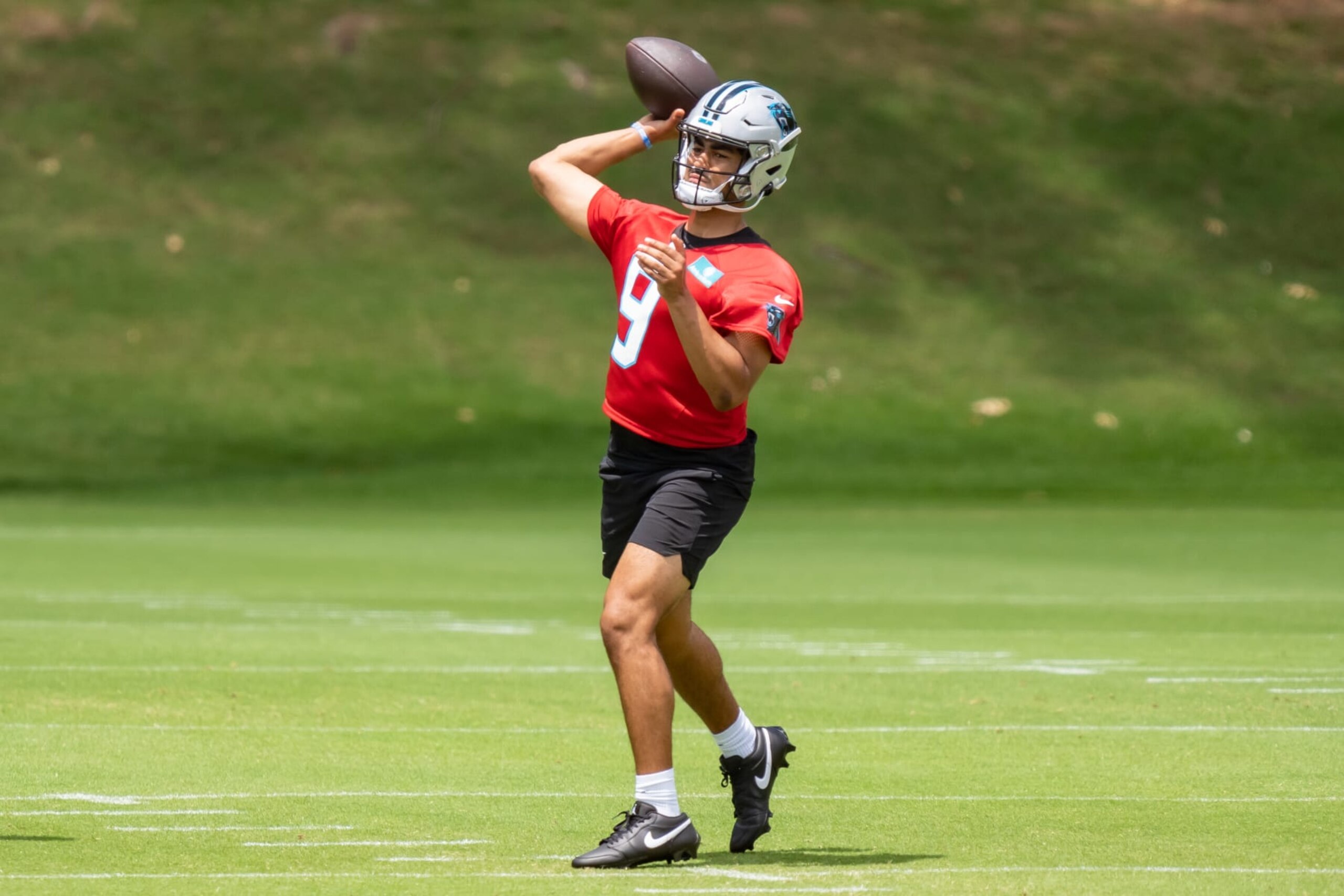 CHARLOTTE, NORTH CAROLINA - MAY 13: Bryce Young #9 of the Carolina Panthers works through a drill during practice at Bank of America Stadium on May 13, 2023 in Charlotte, North Carolina. (Photo by Jacob Kupferman/Getty Images)