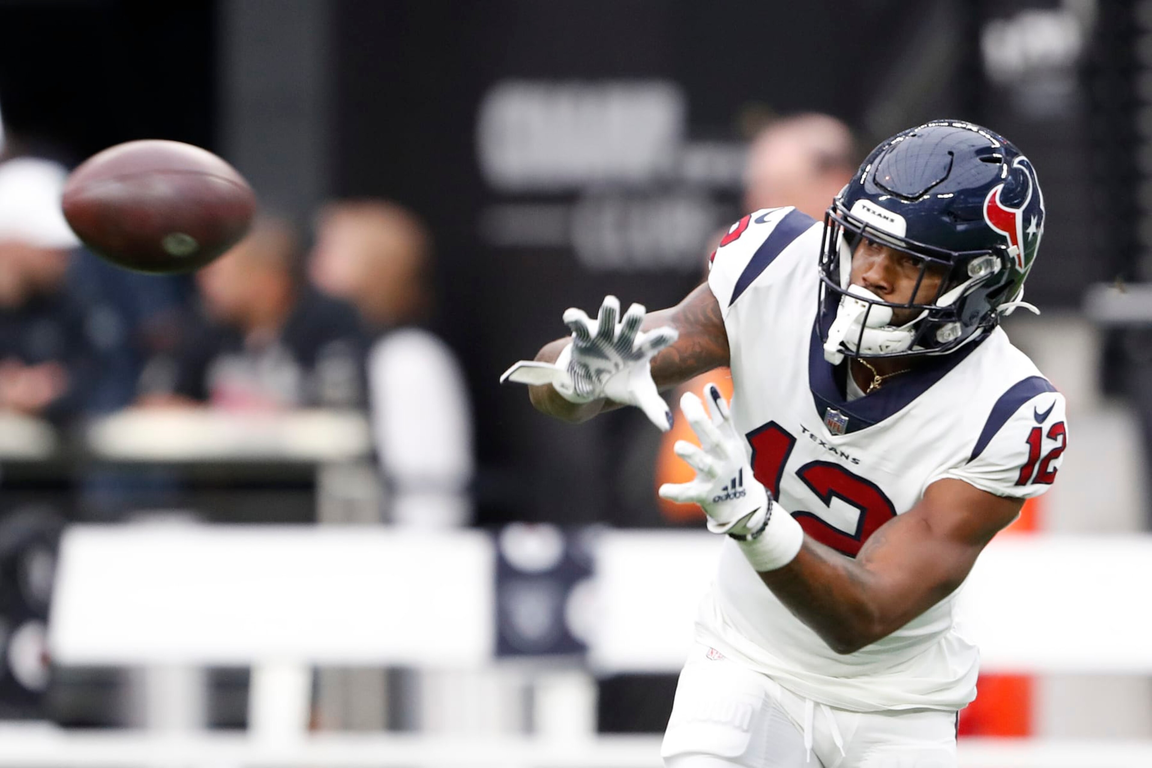 LAS VEGAS, NEVADA - OCTOBER 23: Nico Collins #12 of the Houston Texans warms-up prior to the game against the Las Vegas Raiders at Allegiant Stadium on October 23, 2022 in Las Vegas, Nevada. (Photo by Steve Marcus/Getty Images)