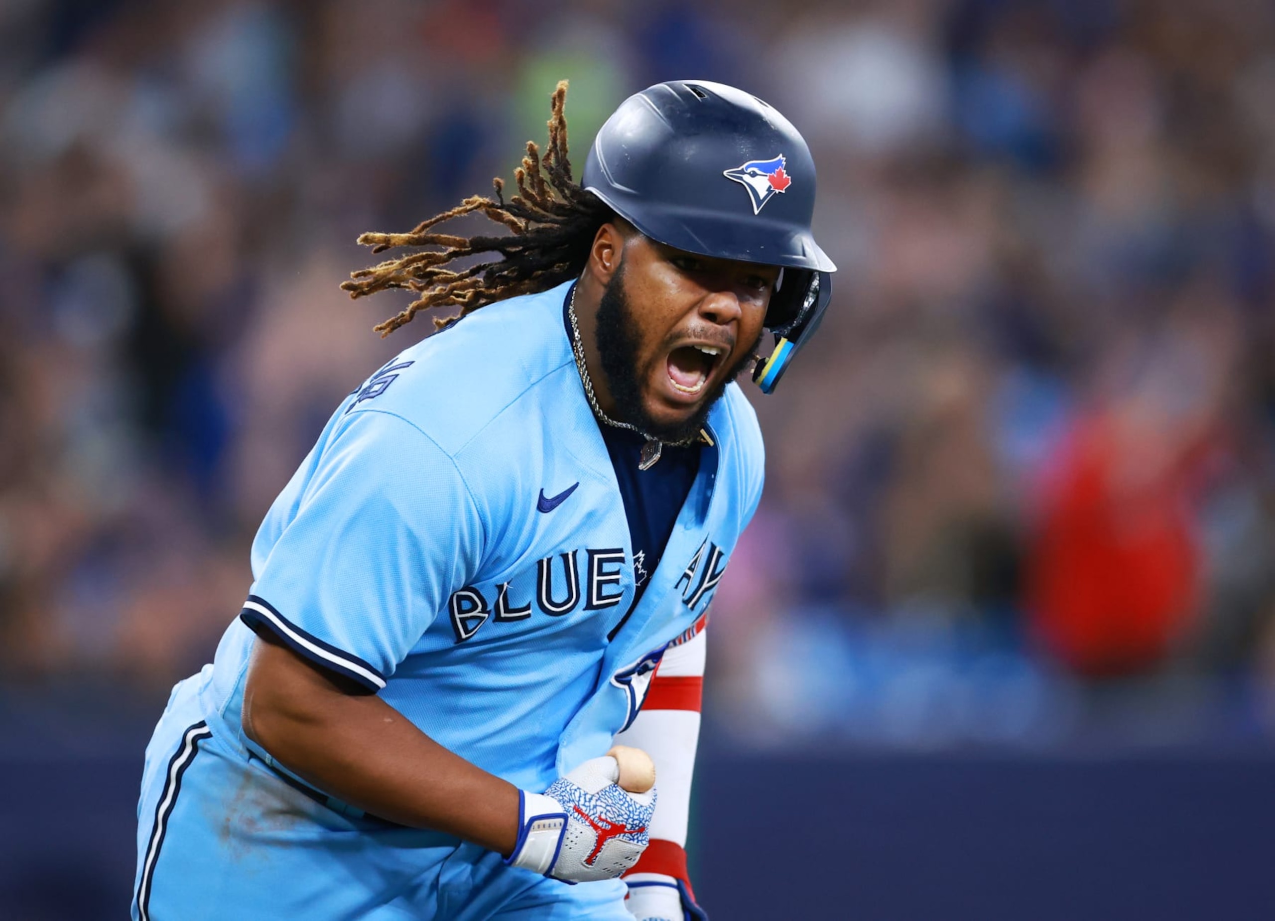 TORONTO, ON - MAY 16:  Vladimir Guerrero Jr. #27 of the Toronto Blue Jays celebrates an RBI single in the fifth inning against the New York Yankees at Rogers Centre on May 16, 2023 in Toronto, Ontario, Canada.  (Photo by Vaughn Ridley/Getty Images)