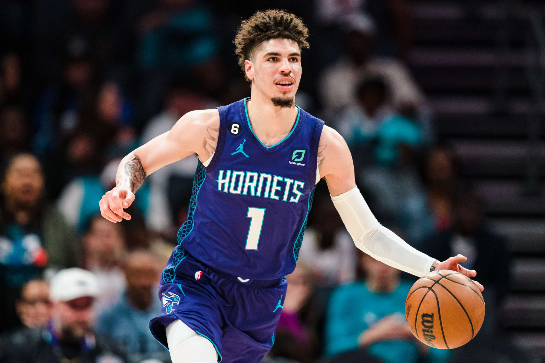 CHARLOTTE, NORTH CAROLINA - FEBRUARY 25: LaMelo Ball #1 of the Charlotte Hornets brings the ball up court against the Miami Heat during their game at Spectrum Center on February 25, 2023 in Charlotte, North Carolina. NOTE TO USER: User expressly acknowledges and agrees that, by downloading and or using this photograph, User is consenting to the terms and conditions of the Getty Images License Agreement. (Photo by Jacob Kupferman/Getty Images)
