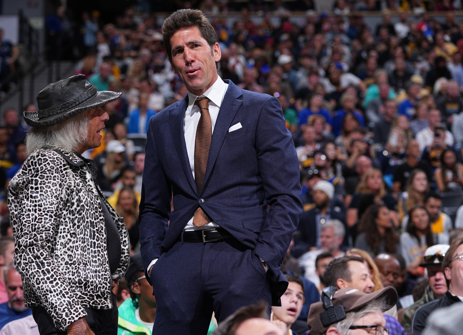 DENVER, CO - APRIL 24: NBA Superfan, James Goldstein talks to General Manager, Bob Myers of the Golden State Warriors during Round 1 Game 4 of the 2022 NBA Playoffs on April 24, 2022 at the Ball Arena in Denver, Colorado. NOTE TO USER: User expressly acknowledges and agrees that, by downloading and/or using this Photograph, user is consenting to the terms and conditions of the Getty Images License Agreement. Mandatory Copyright Notice: Copyright 2022 NBAE (Photo by Bart Young/NBAE via Getty Images)