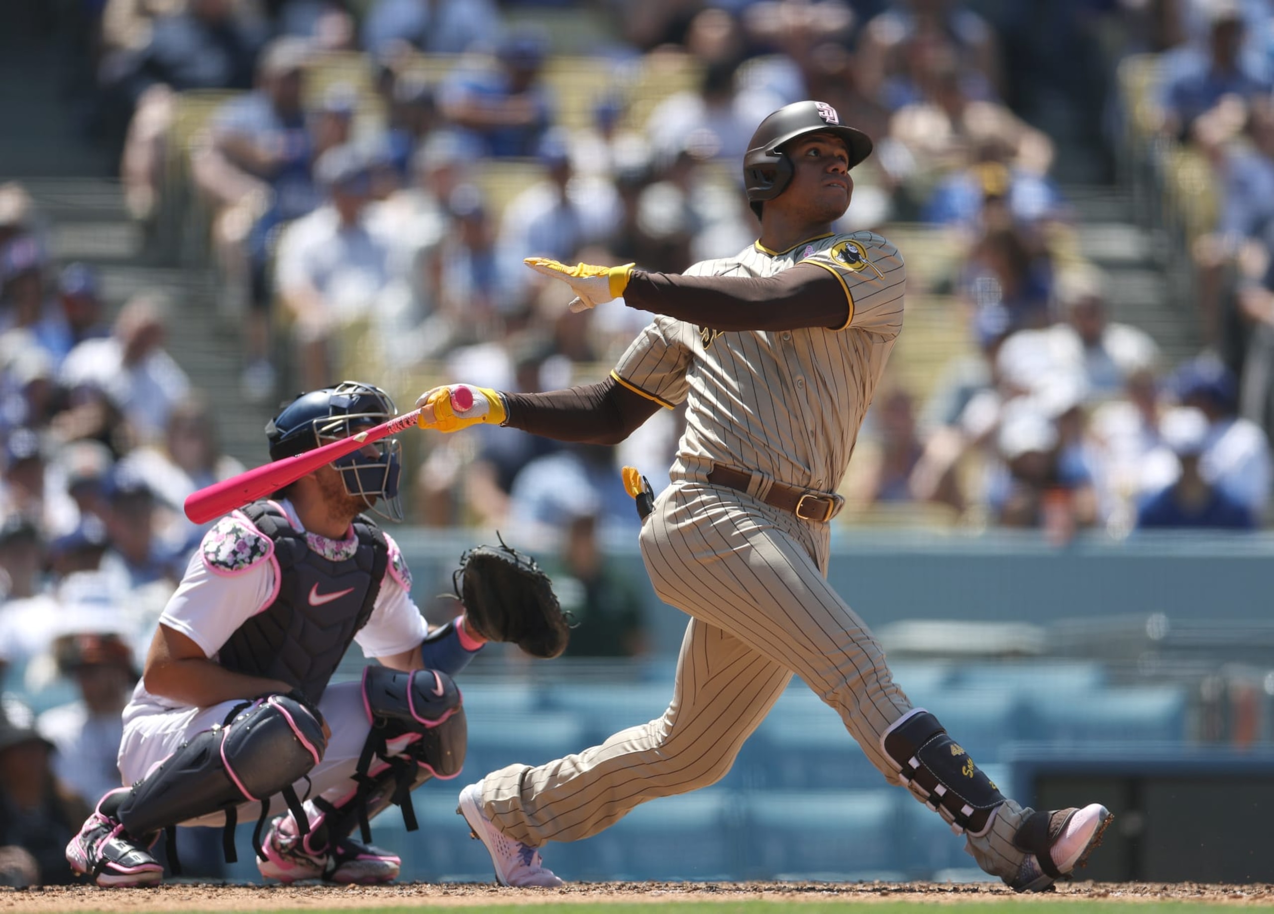LOS ANGELES, CALIFORNIA - MAY 14: Juan Soto #22 of the San Diego Padres at bat in front of Austin Barnes #15 of the Los Angeles Dodgers during a 4-0 Dodgers win at Dodger Stadium on May 14, 2023 in Los Angeles, California. (Photo by Harry How/Getty Images)