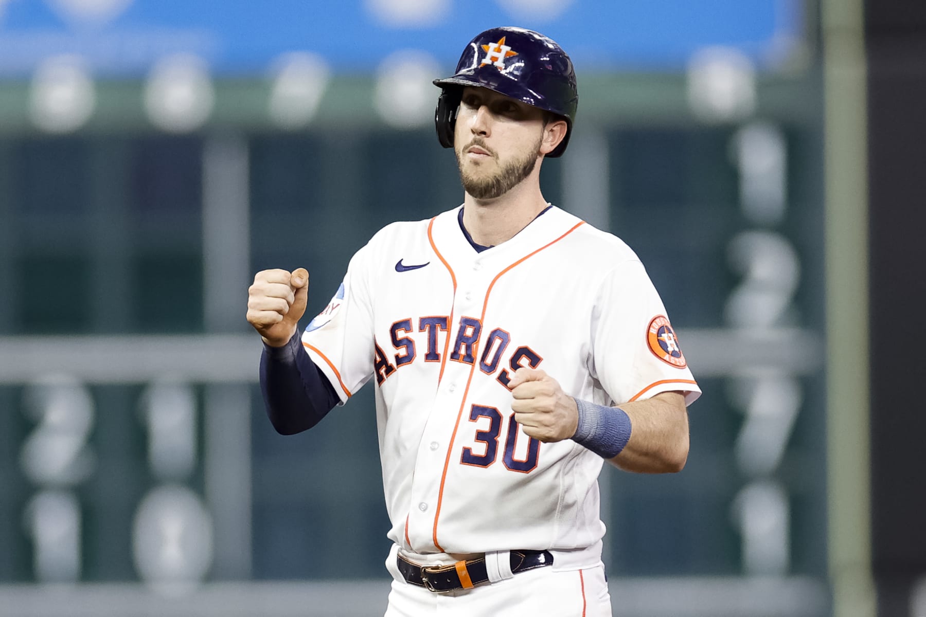 HOUSTON, TEXAS - MAY 16: Kyle Tucker #30 of the Houston Astros reacts to hitting an RBI double during the fourth inning against the Chicago Cubs at Minute Maid Park on May 16, 2023 in Houston, Texas. (Photo by Carmen Mandato/Getty Images)