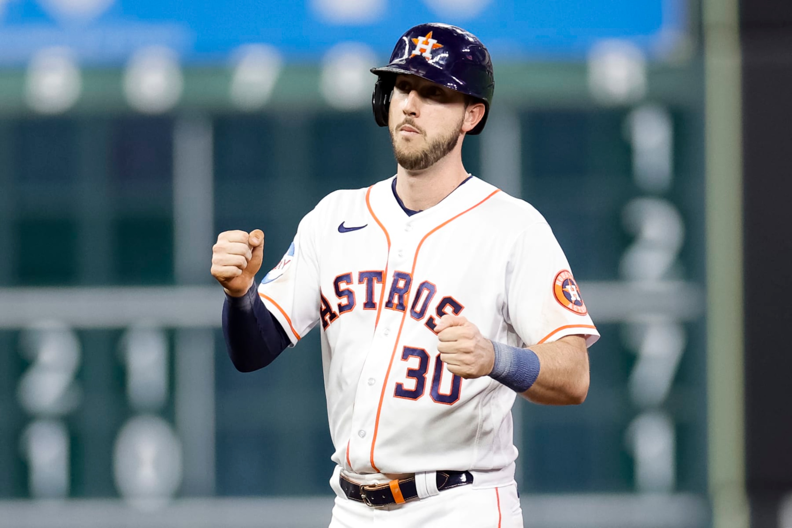 HOUSTON, TEXAS - MAY 16: Kyle Tucker #30 of the Houston Astros reacts to hitting an RBI double during the fourth inning against the Chicago Cubs at Minute Maid Park on May 16, 2023 in Houston, Texas. (Photo by Carmen Mandato/Getty Images)