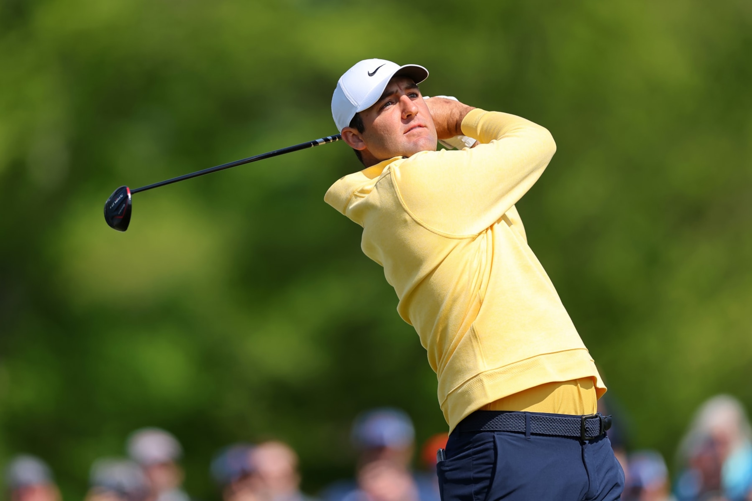 ROCHESTER, NEW YORK - MAY 18: Scottie Scheffler of the United States plays his shot from the 12th tee during the first round of the 2023 PGA Championship at Oak Hill Country Club on May 18, 2023 in Rochester, New York. (Photo by Michael Reaves/Getty Images)