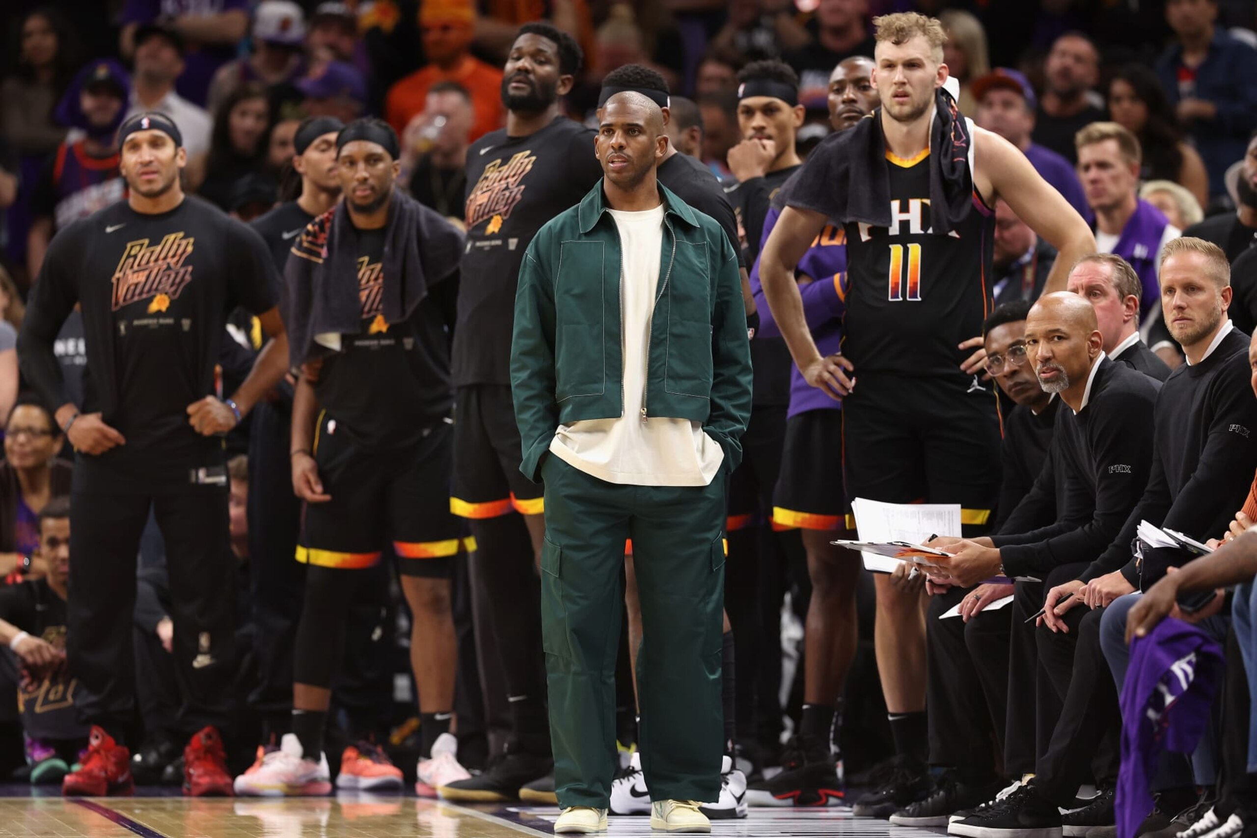 PHOENIX, ARIZONA - MAY 05: Chris Paul #3 of the Phoenix Suns watches from the bench with teammates during the second half of Game Three of the NBA Western Conference Semifinals at Footprint Center on May 05, 2023 in Phoenix, Arizona.  The Suns defeated the Nuggets 121-114. NOTE TO USER: User expressly acknowledges and agrees that, by downloading and or using this photograph, User is consenting to the terms and conditions of the Getty Images License Agreement.  (Photo by Christian Petersen/Getty Images)