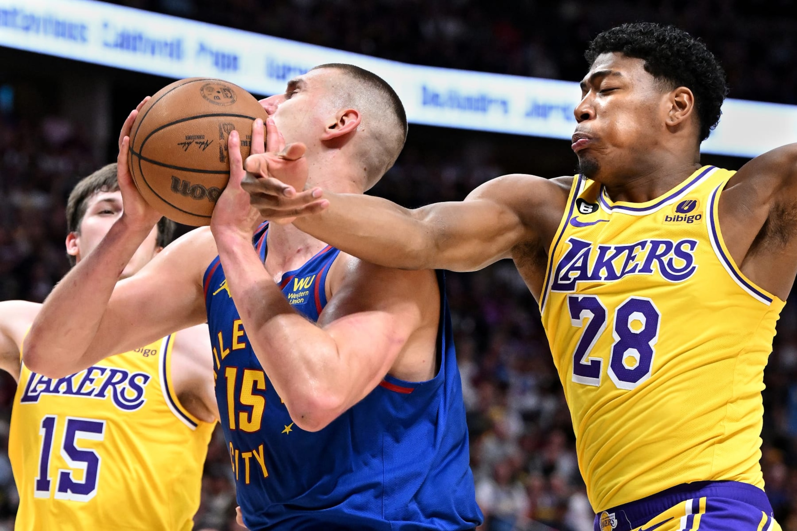 Denver, Colorado May 16, 2023-Lakers Rui Hachimura tries to steal the ball away from Nuggets Nikola Jokic in Game 1 of the Western Conference Finals in Denver Tuesday. (Wally Skalij/Los Angeles Times via Getty Images)