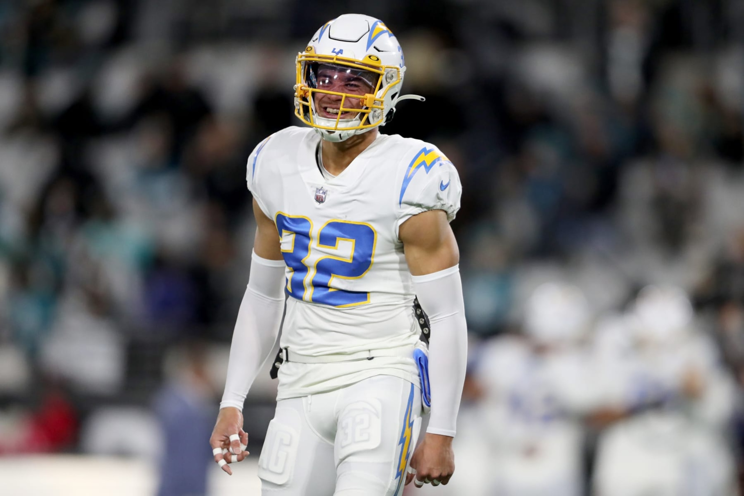 JACKSONVILLE, FLORIDA - JANUARY 14: Alohi Gilman #32 of the Los Angeles Chargers warms up prior to a game against the Jacksonville Jaguars in the AFC Wild Card playoff game at TIAA Bank Field on January 14, 2023 in Jacksonville, Florida. (Photo by Courtney Culbreath/Getty Images)