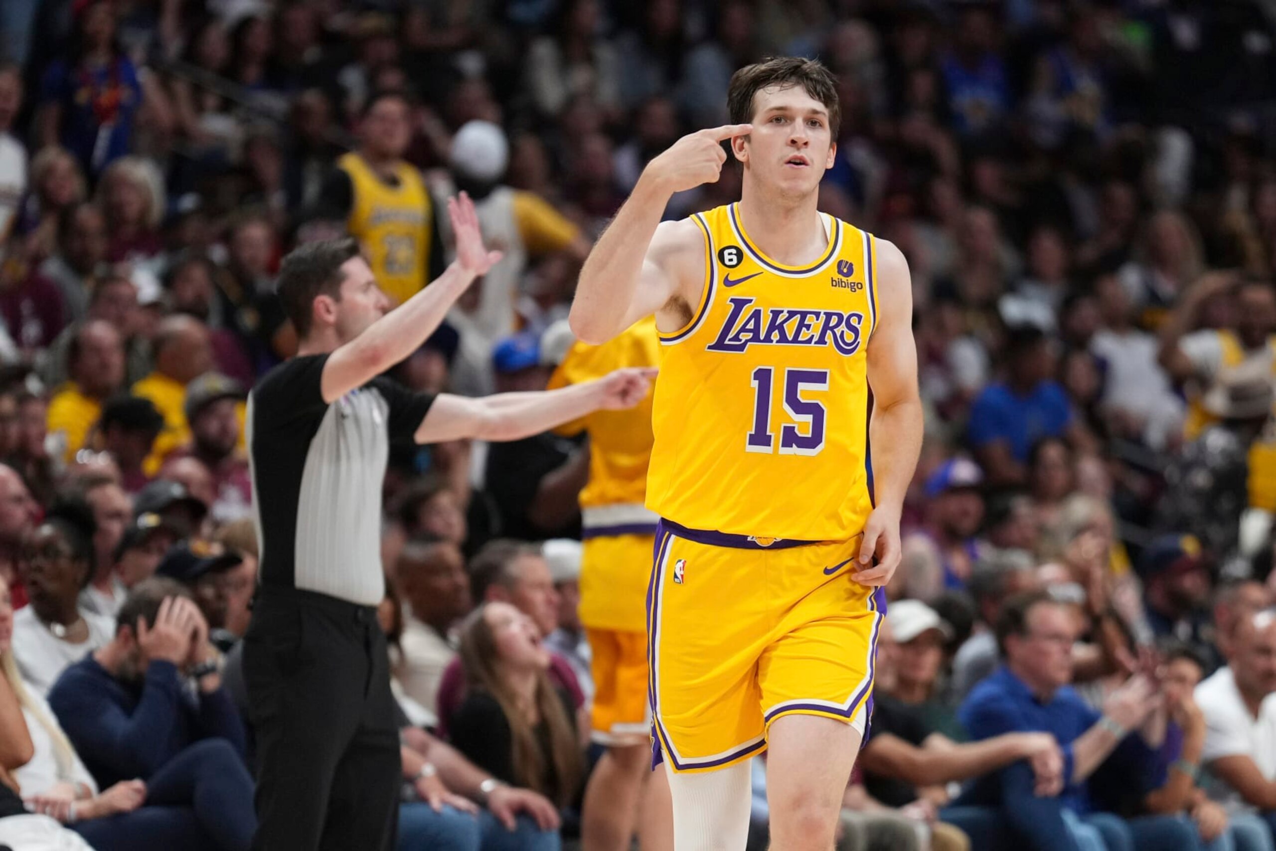 Los Angeles Lakers guard Austin Reaves (15) celebrates a basket against the Denver Nuggets during the second half of Game 1 of the NBA basketball Western Conference Finals series, Tuesday, May 16, 2023, in Denver. (AP Photo/Jack Dempsey)