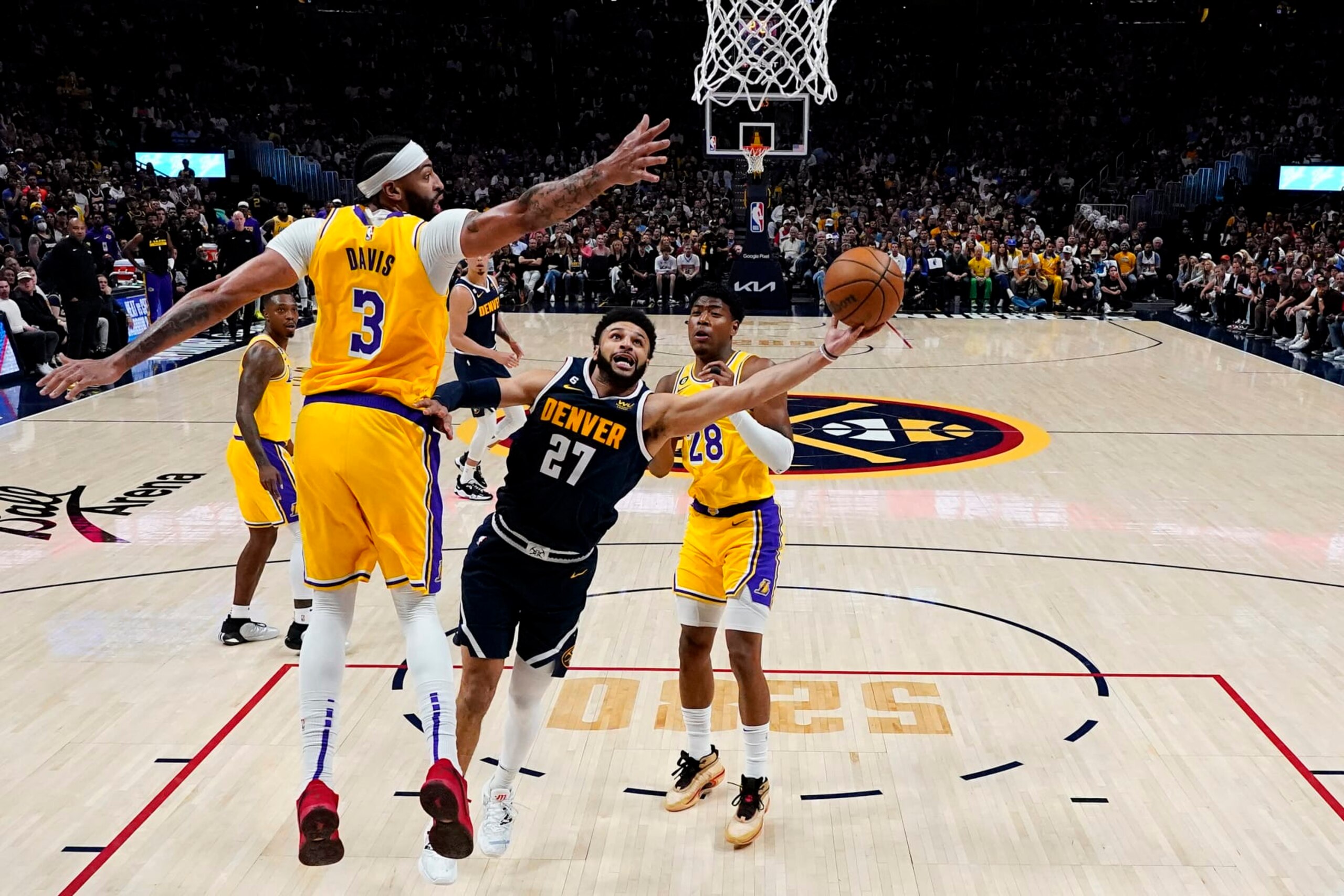 Denver Nuggets guard Jamal Murray (27) shoots under Los Angeles Lakers forward Anthony Davis (3) during the first half of Game 2 of the NBA basketball Western Conference Finals series, Thursday, May 18, 2023, in Denver. (AP Photo/Jack Dempsey) Denver Nuggets guard Jamal Murray (27) shoots under Los Angeles Lakers forward Anthony Davis (3) during the first half of Game 2 of the NBA basketball Western Conference Finals series, Thursday, May 18, 2023, in Denver. (AP Photo/Jack Dempsey)