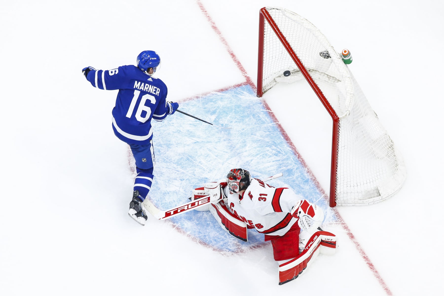 TORONTO, ON - FEBRUARY 7: Mitchell Marner #16 of the Toronto Maple Leafs scores a goal against Frederik Andersen #31 of the Carolina Hurricanes during the third period at the Scotiabank Arena on February 7, 2022 in Toronto, Ontario, Canada. (Photo by Vaughn Ridley/NHLI via Getty Images)