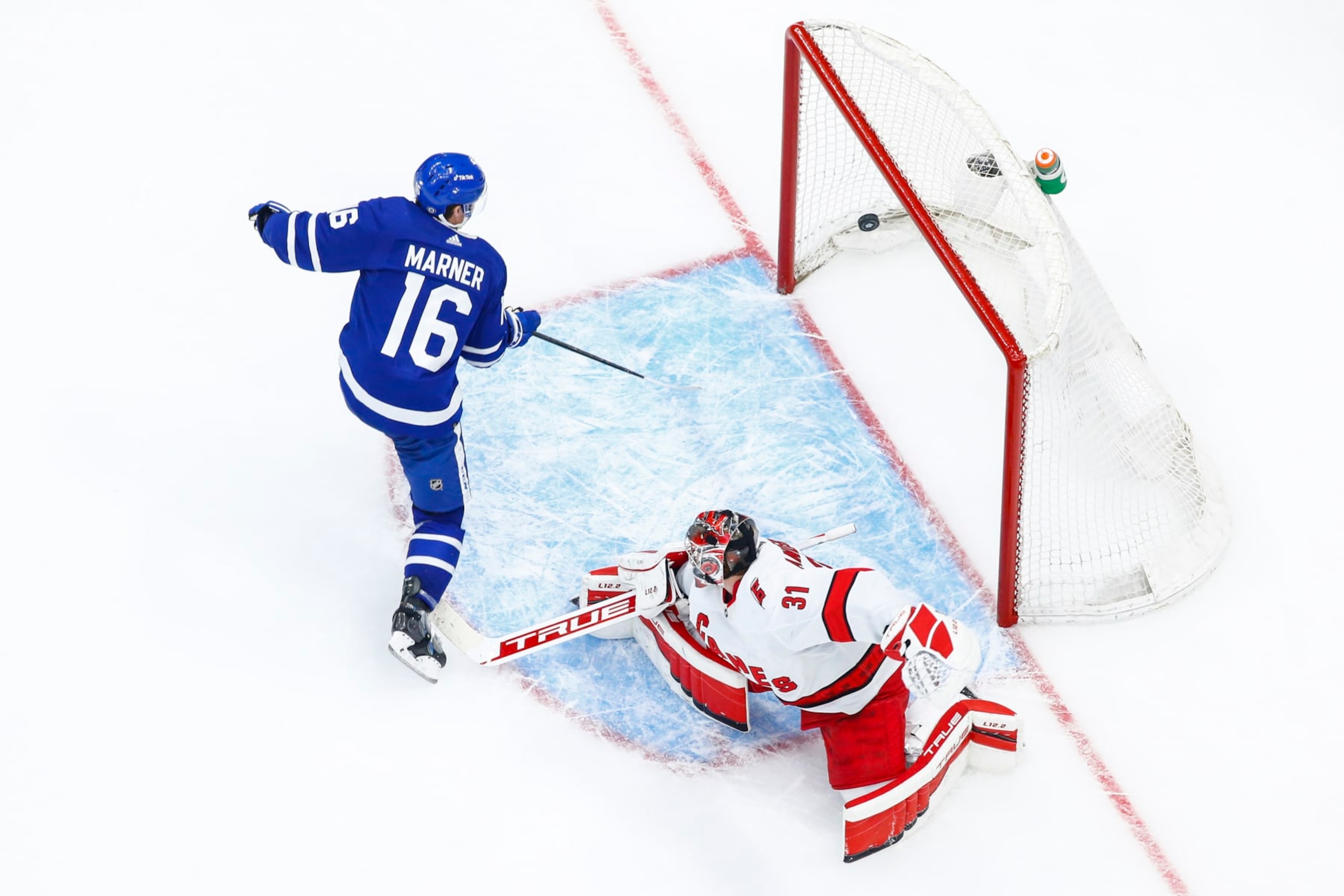TORONTO, ON - FEBRUARY 7: Mitchell Marner #16 of the Toronto Maple Leafs scores a goal against Frederik Andersen #31 of the Carolina Hurricanes during the third period at the Scotiabank Arena on February 7, 2022 in Toronto, Ontario, Canada. (Photo by Vaughn Ridley/NHLI via Getty Images)