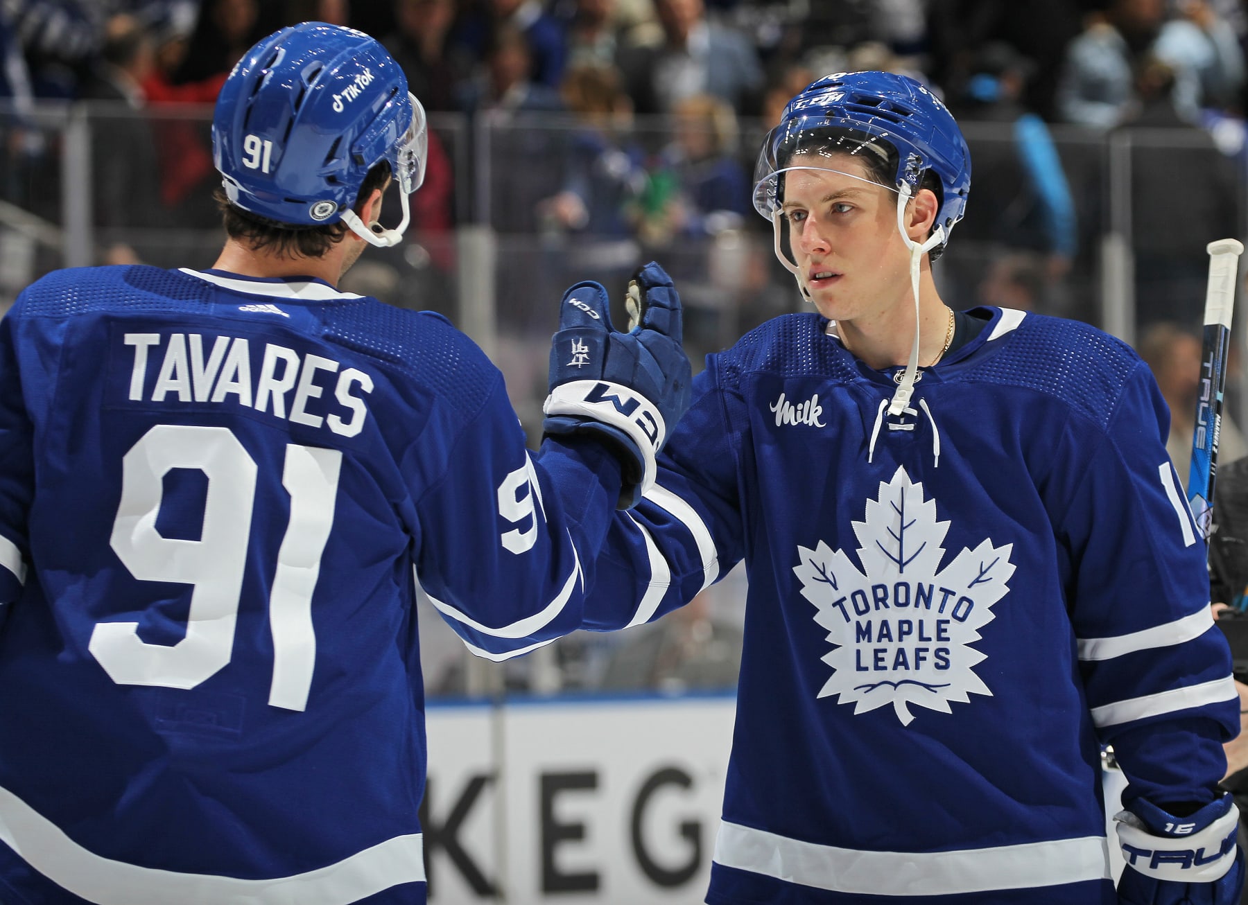 TORONTO, CANADA - FEBRUARY 15:  Mitchell Marner #16 and John Tavares #91 of the Toronto Maple Leafs celebrate a victory against the Chicago Blackhawks at Scotiabank Arena on February 15, 2023 in Toronto, Ontario, Canada. The Maple Leafs defeated the Blackhawks 5-2. (Photo by Claus Andersen/Getty Images)
