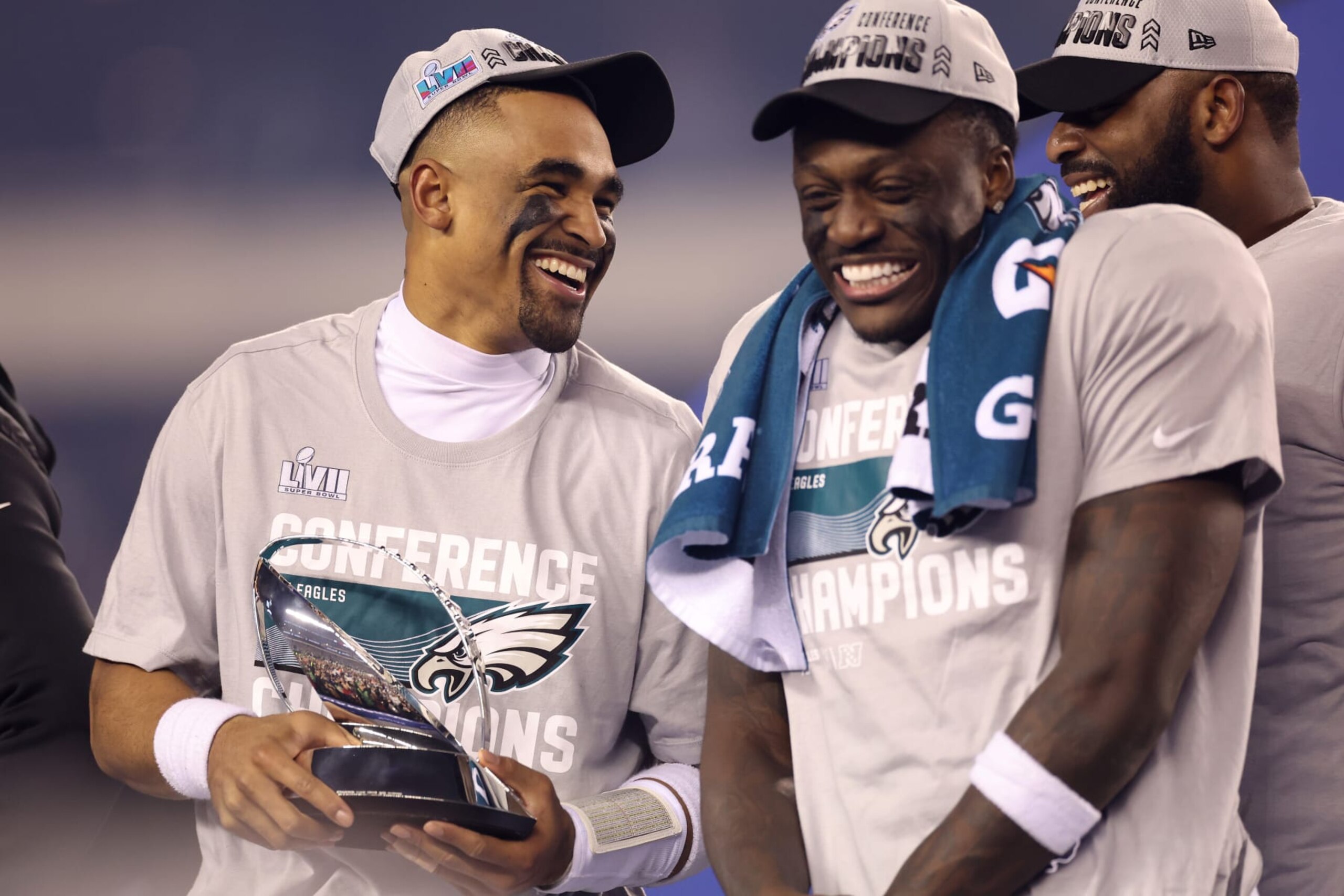 PHILADELPHIA, PENNSYLVANIA - JANUARY 29: Jalen Hurts #1 of the Philadelphia Eagles holds the George Halas Trophy with A.J. Brown #11 after defeating the San Francisco 49ers to win the NFC Championship Game at Lincoln Financial Field on January 29, 2023 in Philadelphia, Pennsylvania. The Philadelphia Eagles defeated the San Francisco 49ers with a score of 31 to 7. (Photo by Tim Nwachukwu/Getty Images)