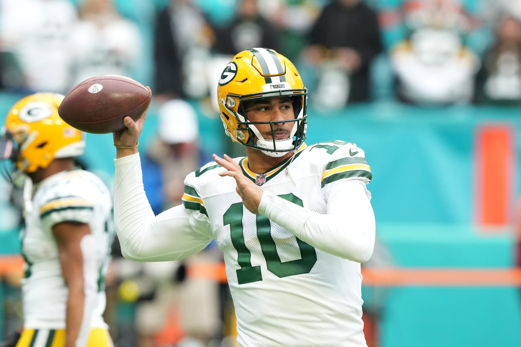 MIAMI GARDENS, FLORIDA - DECEMBER 25: Jordan Love #10 of the Green Bay Packers warms up before the game against the Miami Dolphins at Hard Rock Stadium on December 25, 2022 in Miami Gardens, Florida. (Photo by Eric Espada/Getty Images)