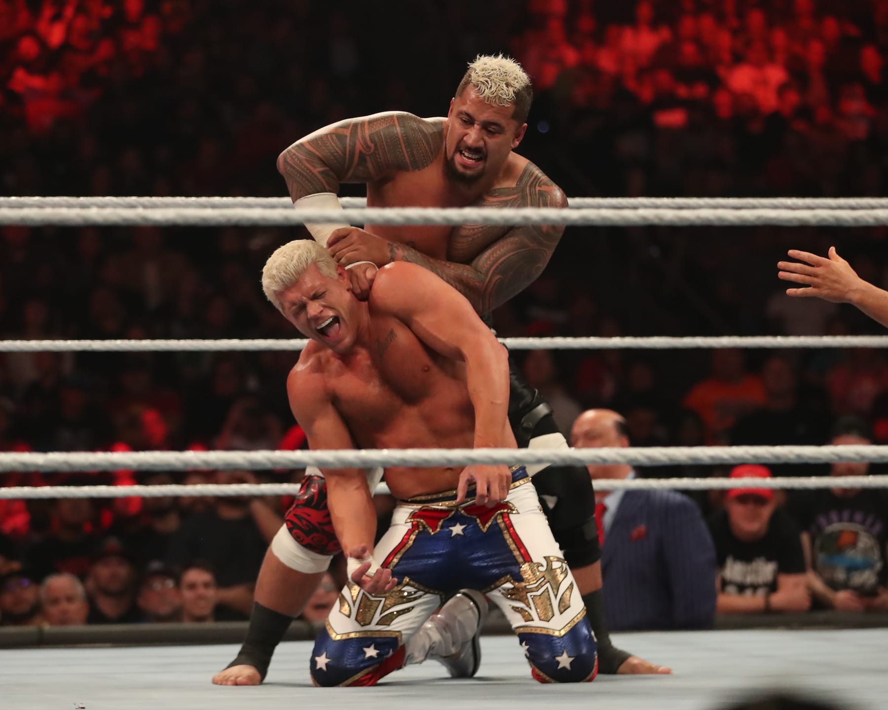 PHOENIX, ARIZONA - MARCH 27: Solo Sikoa chokes Cody Rhodes on their bout during WWE WrestleMania RAW at the Footprint Center on March 27, 2023 in Phoenix, Arizona, United States. (Photo by Alejandro Salazar/PX Images/Icon Sportswire via Getty Images)